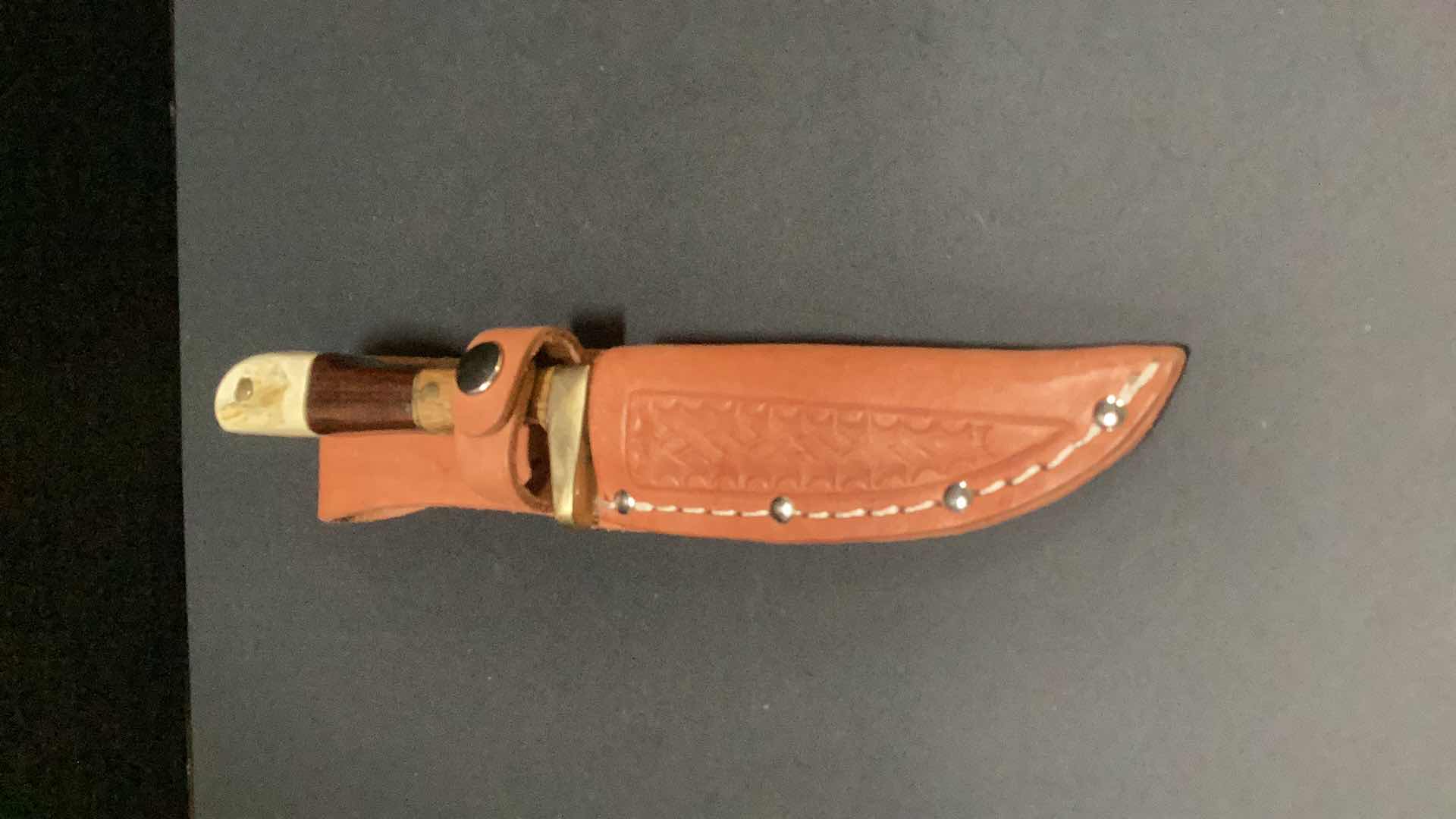 Photo 1 of MULTICOLORED WOODEN HANDLED 8” KNIFE