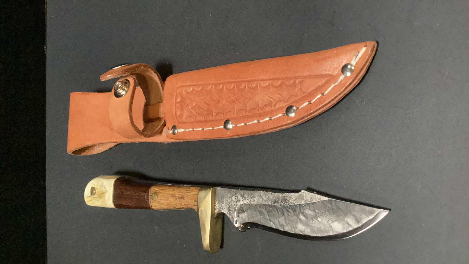 Photo 1 of MULTICOLORED WOODEN HANDLED 8” KNIFE