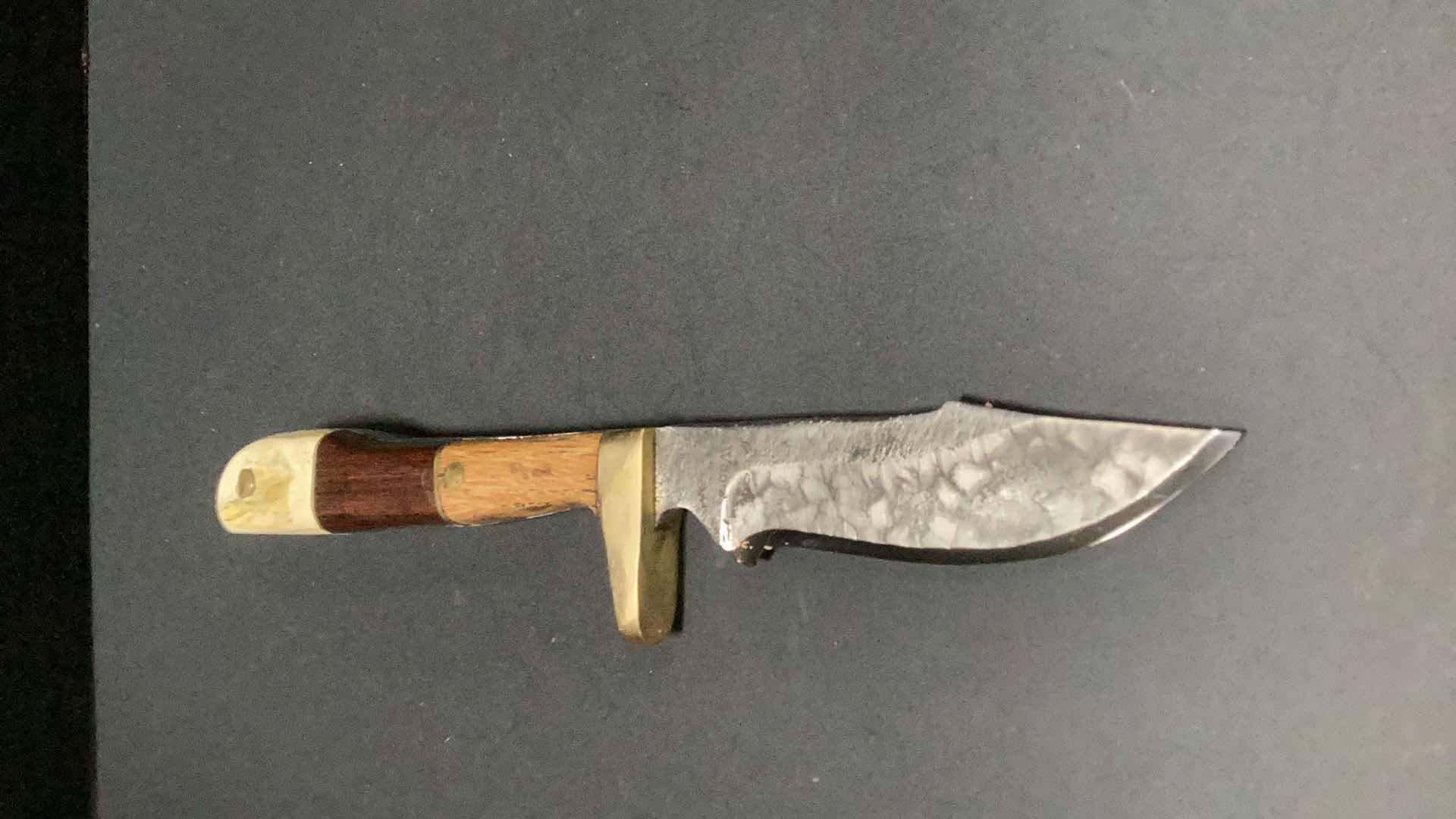 Photo 1 of MULTICOLORED WOODEN HANDLED 8” KNIFE