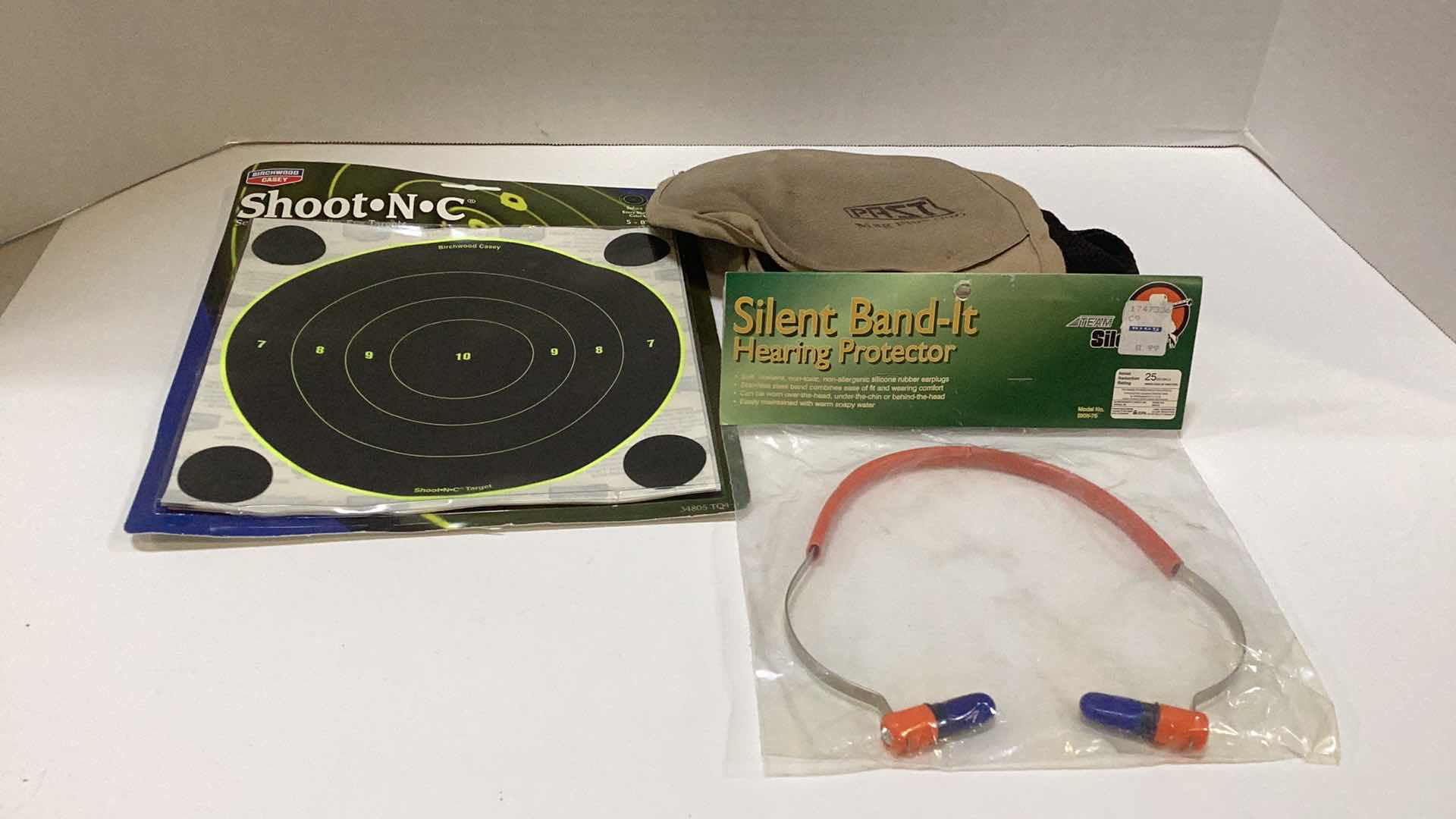 Photo 1 of ASSORTED GUN RANGE ITEMS: TARGETS, EAR PROTECTION,SHOULDER PAD