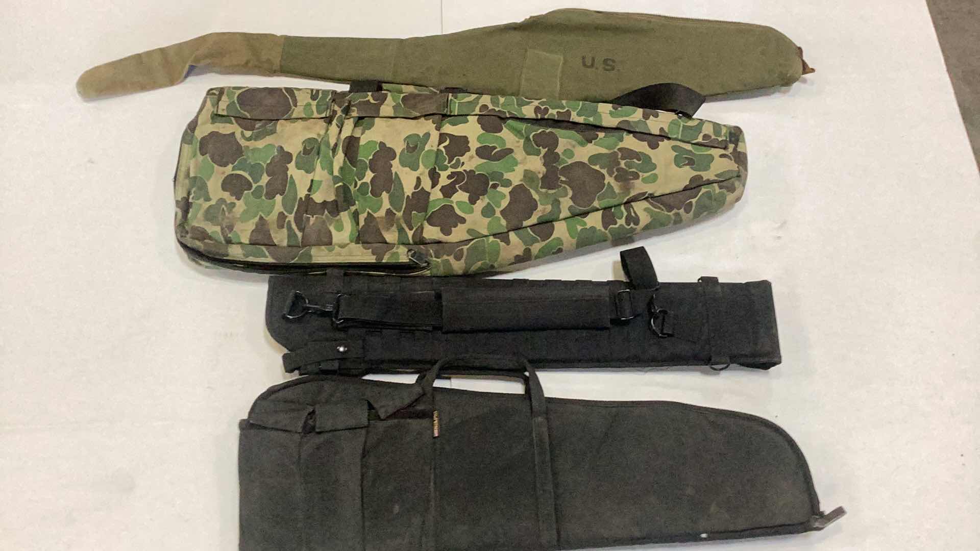 Photo 1 of FOUR CANVAS RIFLE CASES