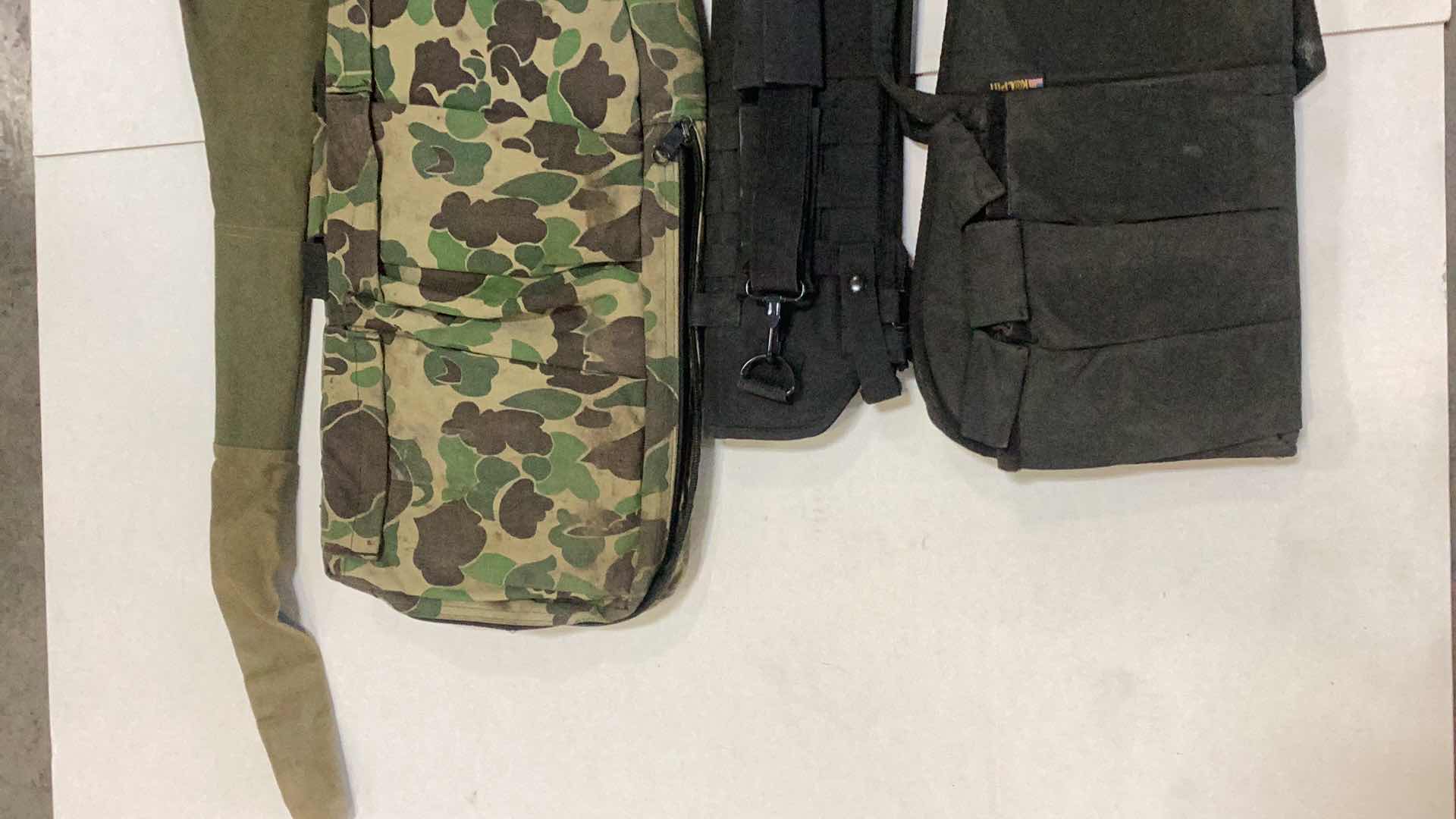 Photo 1 of FOUR CANVAS RIFLE CASES