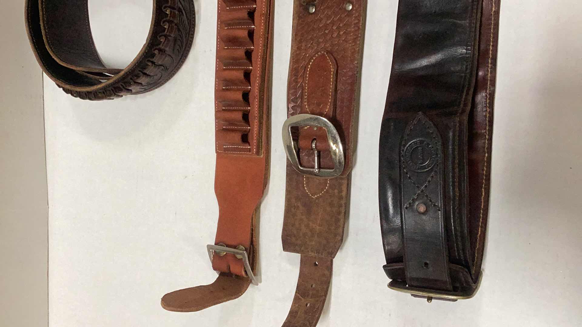 Photo 1 of FOUR LEATHER BANDOLIER BULLET BELTS