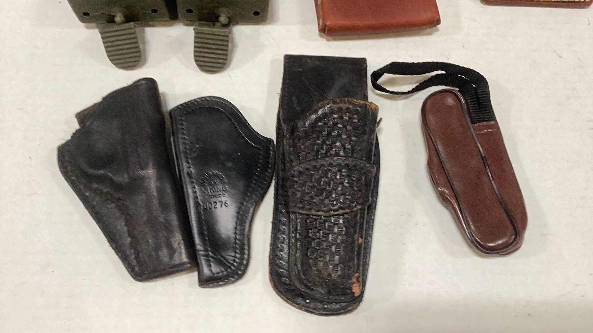 Photo 1 of HOLSTERS AND ASSORTED GOODS