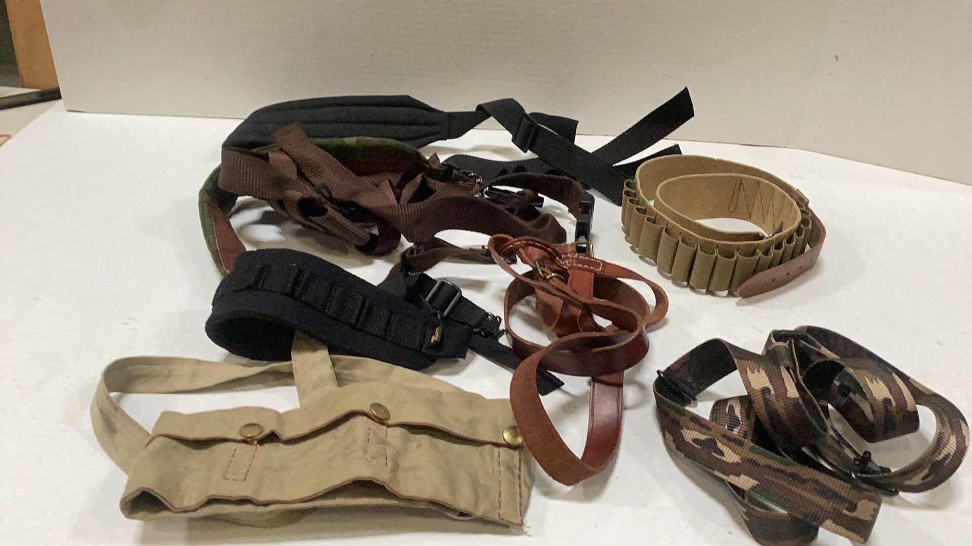 Photo 1 of BANDOLIERS, STRAPS, AND  INTAGE AMMO HOLDER