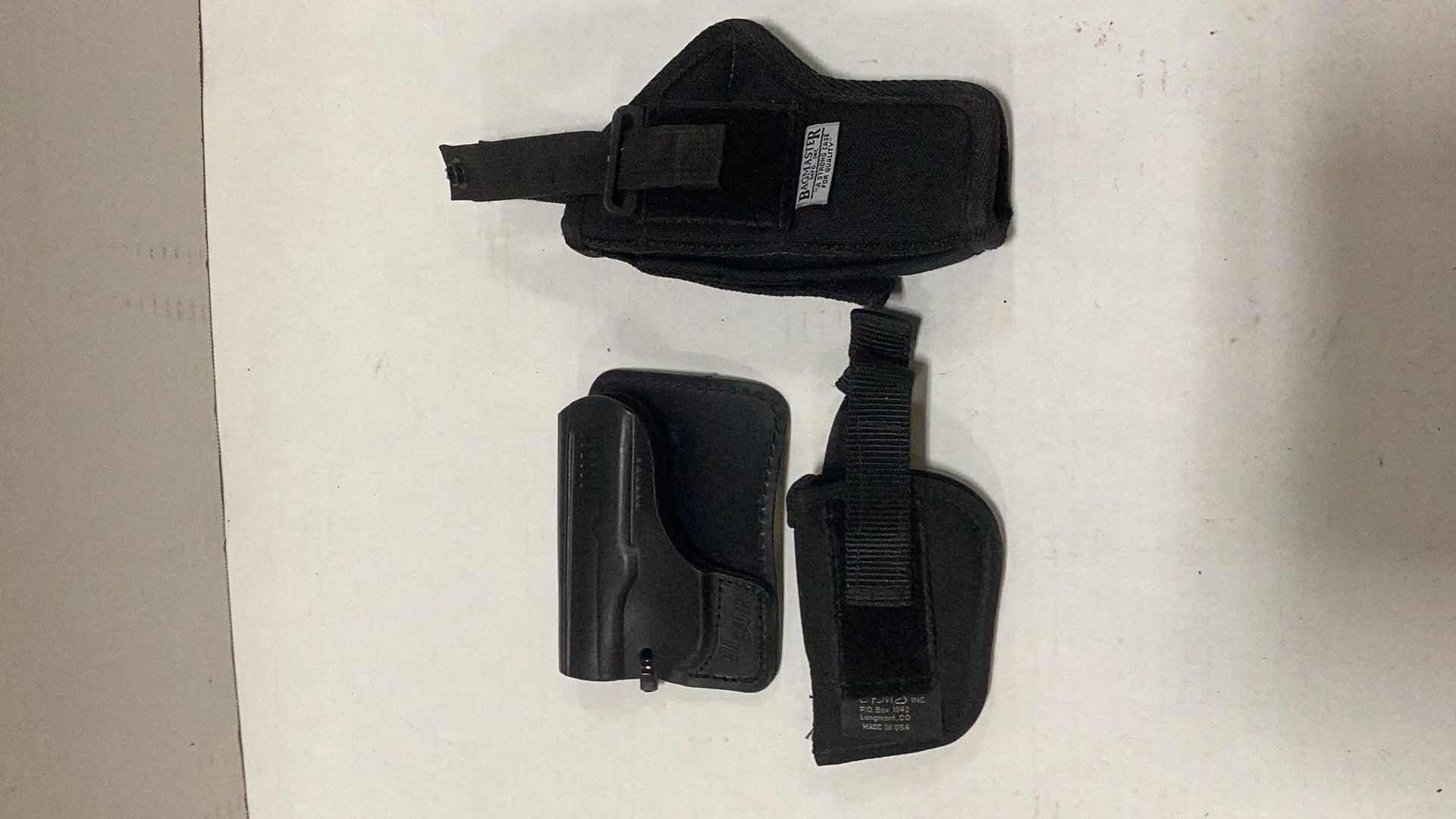 Photo 1 of ASSORTED PISTOL HOLSTERS SIG SAUER