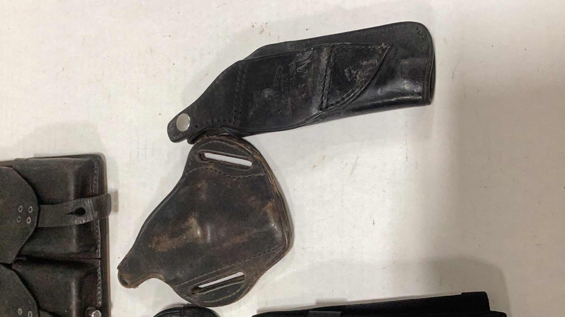 Photo 1 of ASSORTED VINTAGE POLICE EQUIPMENT AND HOLSTERS