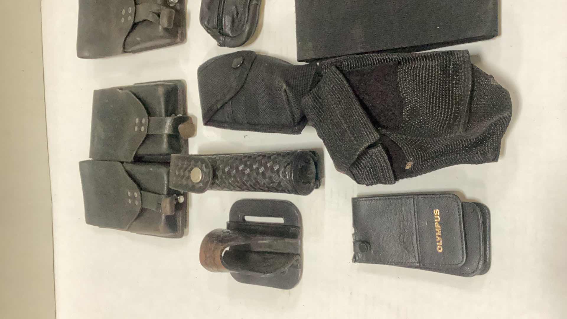 Photo 1 of ASSORTED VINTAGE POLICE EQUIPMENT AND HOLSTERS