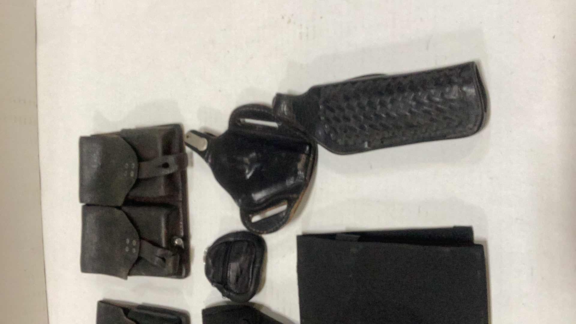 Photo 1 of ASSORTED VINTAGE POLICE EQUIPMENT AND HOLSTERS