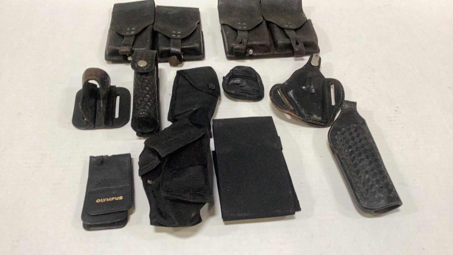 Photo 1 of ASSORTED VINTAGE POLICE EQUIPMENT AND HOLSTERS