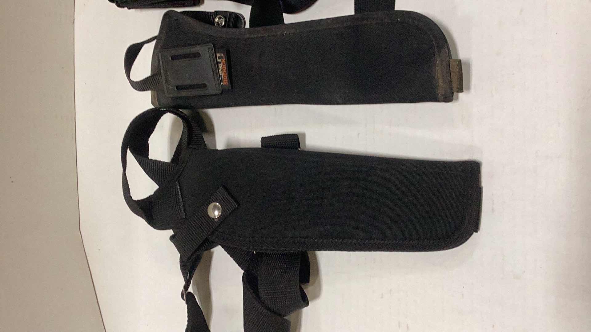 Photo 1 of FOUR PISTOL HOLSTERS