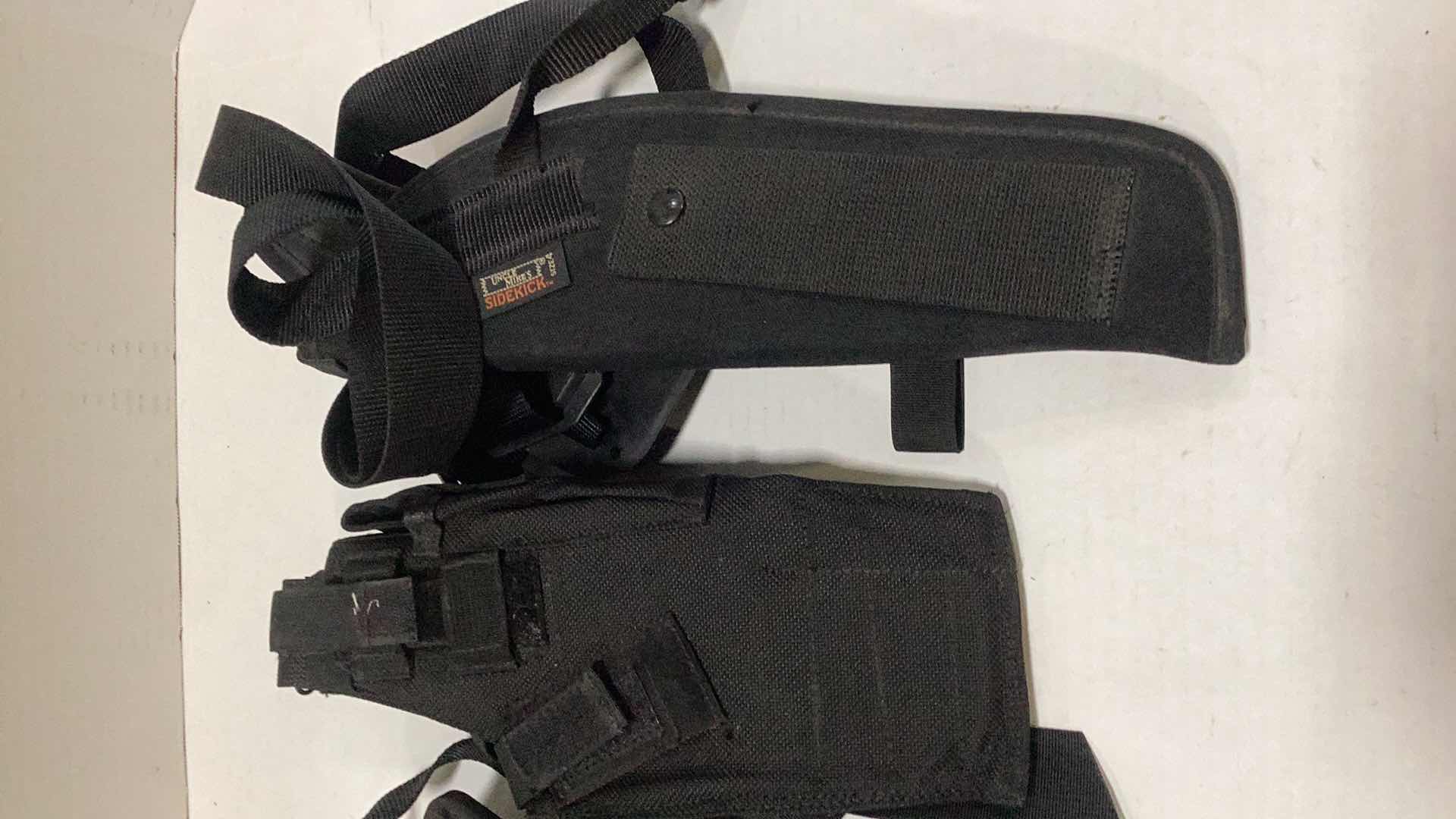 Photo 1 of FOUR PISTOL HOLSTERS