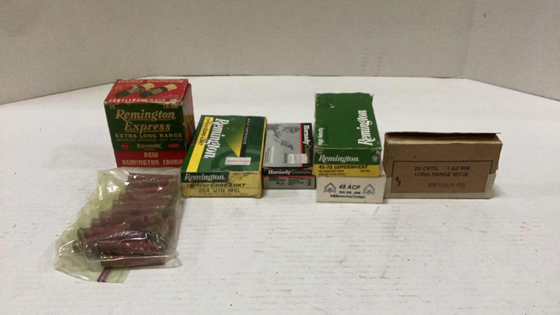 Photo 1 of METAL AMMUNITION CASE 11 X 6 X 32” H, WITH BONUS ASSORTED AMMUNITION