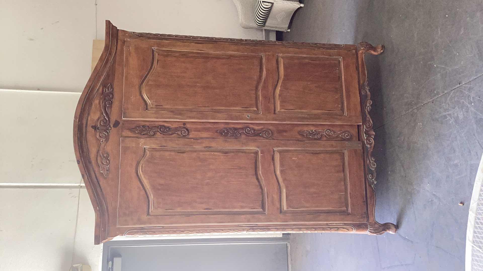 Photo 1 of KNOTTY WOOD ENTERTAINMENT CENTER 55” X 25” H 76”