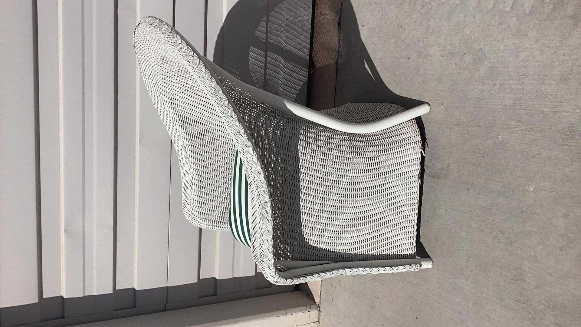 Photo 1 of WHITE RATTAN OUTDOOR ARMCHAIR W. CUSHION