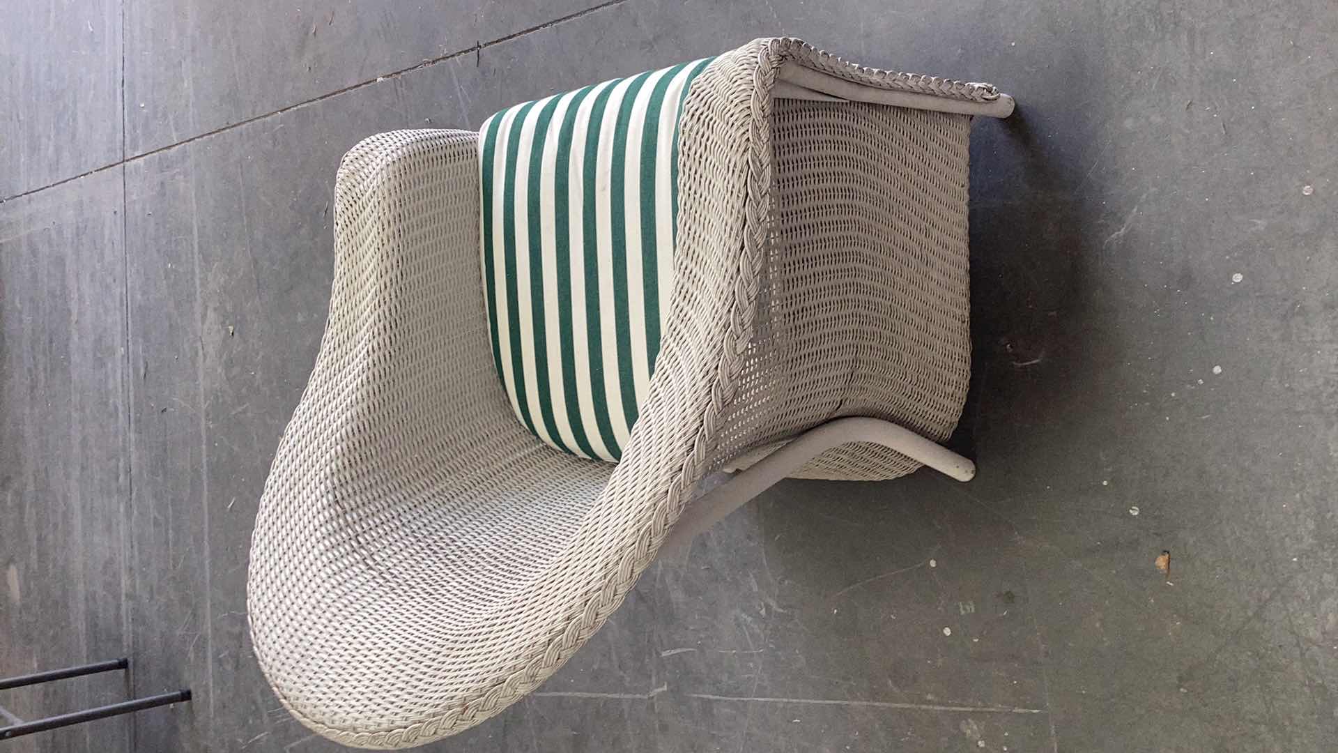 Photo 1 of WHITE RATTAN OUTDOOR ARMCHAIR W. CUSHION