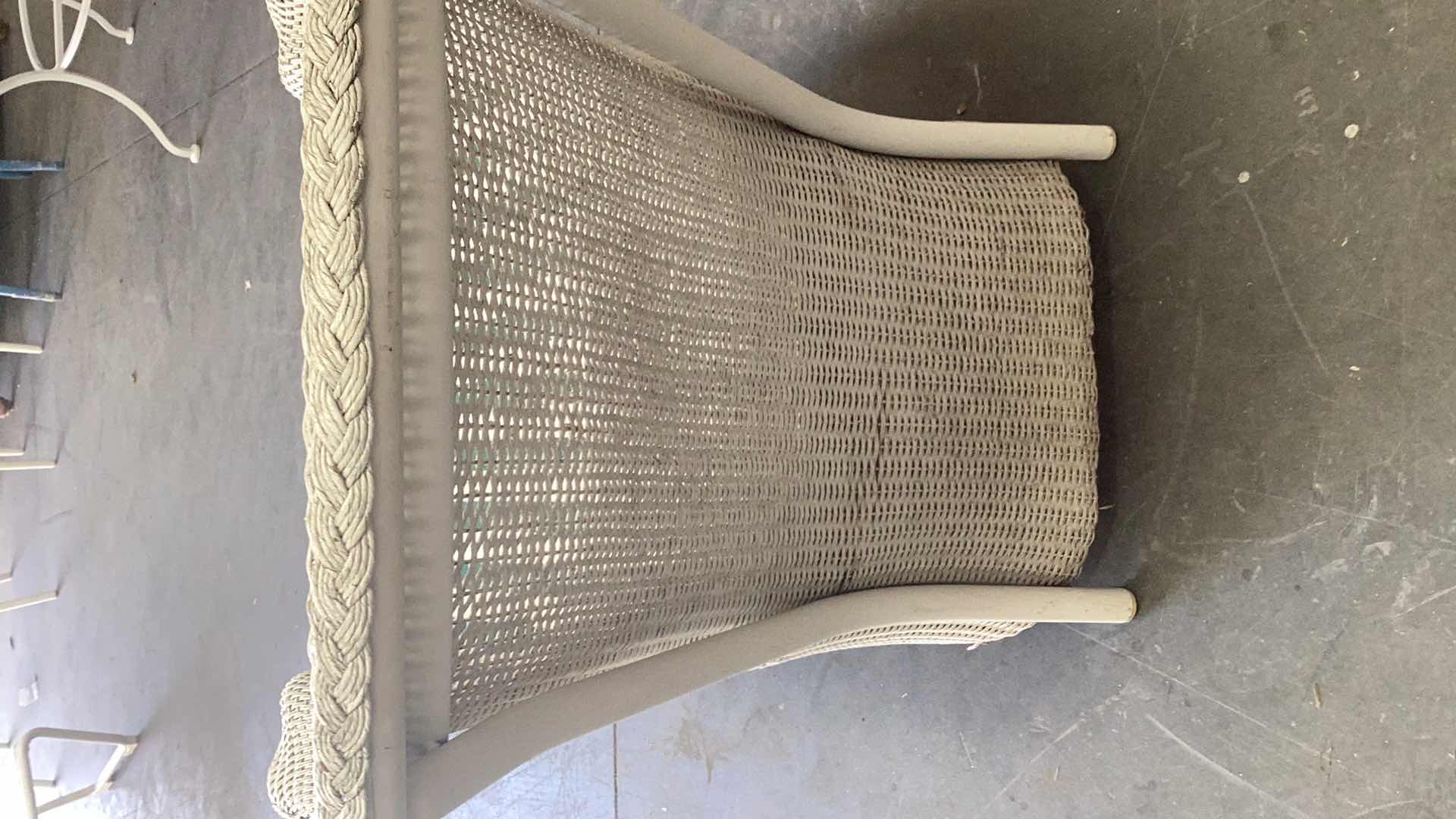 Photo 1 of WHITE RATTAN OUTDOOR ARMCHAIR W. CUSHION