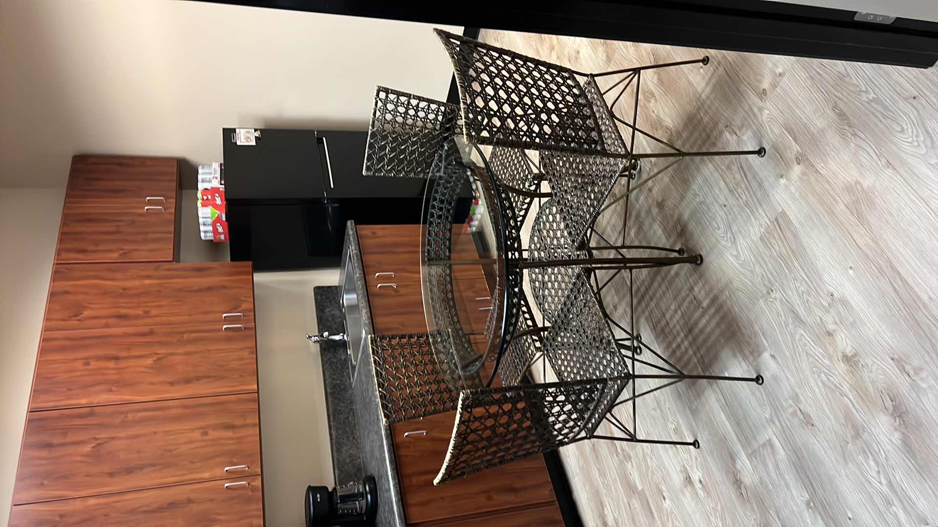 Photo 1 of 36” ROUND CANE W GLASSTOP TABLE W 4 CANE SIDE CHAIRS