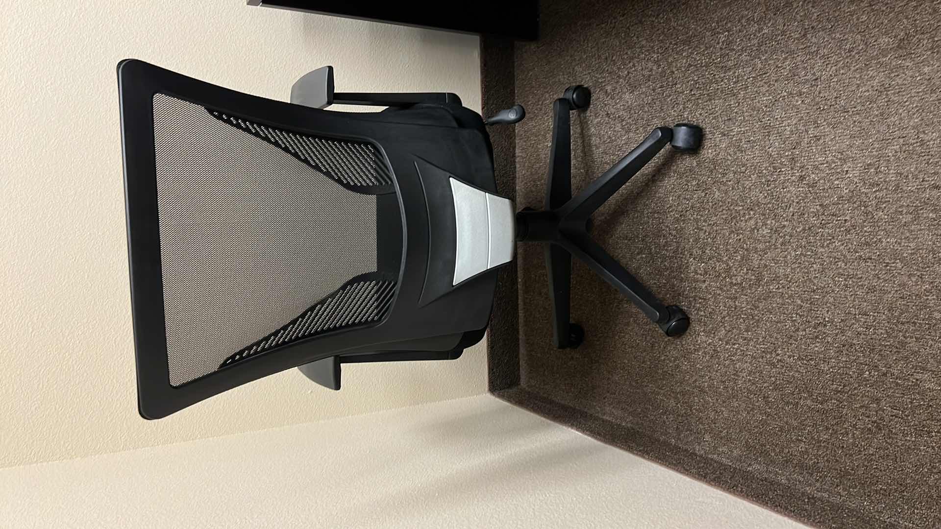 Photo 1 of BLACK MESH BACK SWIVEL OFFICE CHAIR ON CASTERS