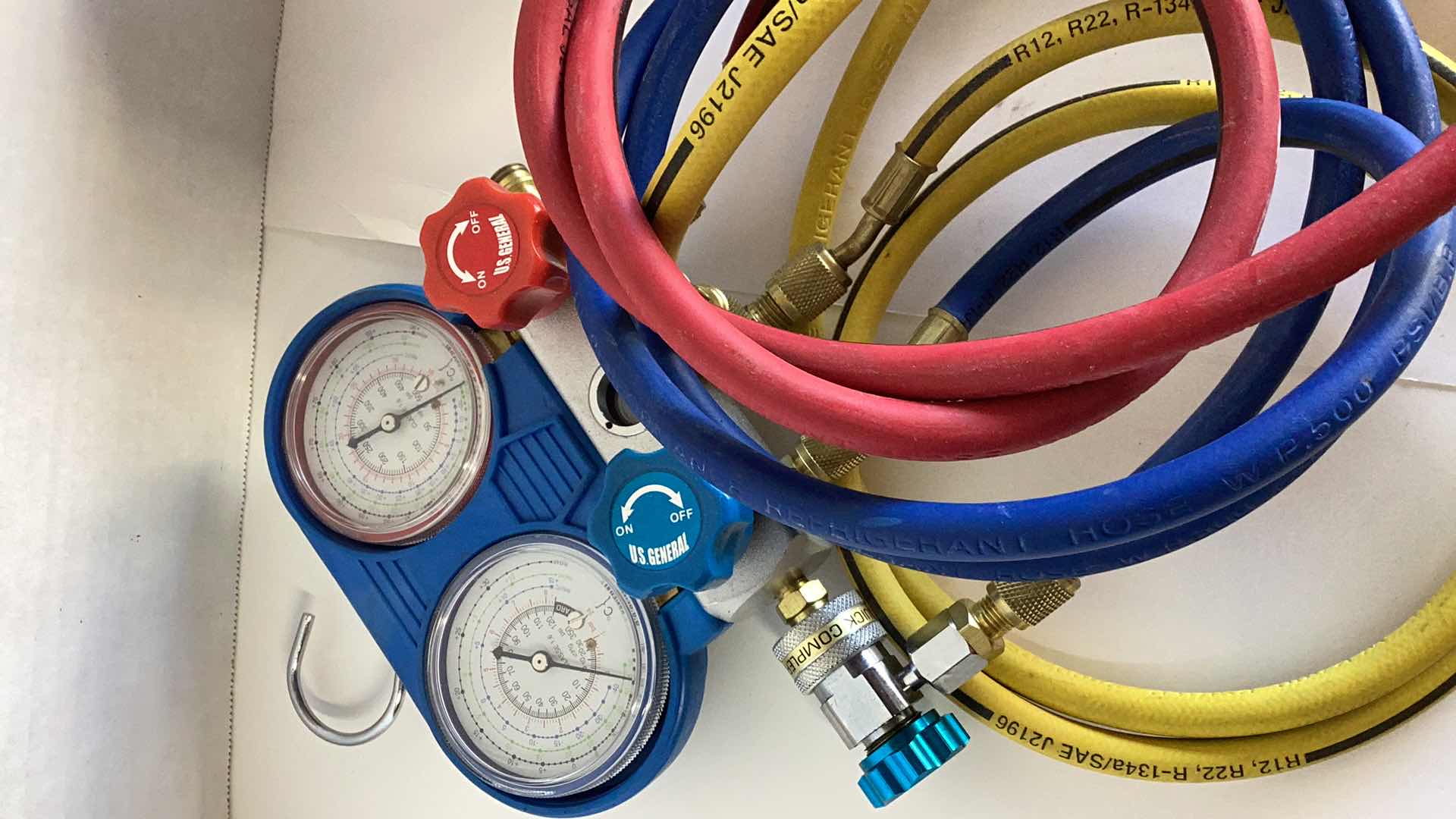 Photo 1 of AUTOMOBILE AIR CONDITIONER CHARGING CABLES, REFRIGERANT, AND OIL CHARGE