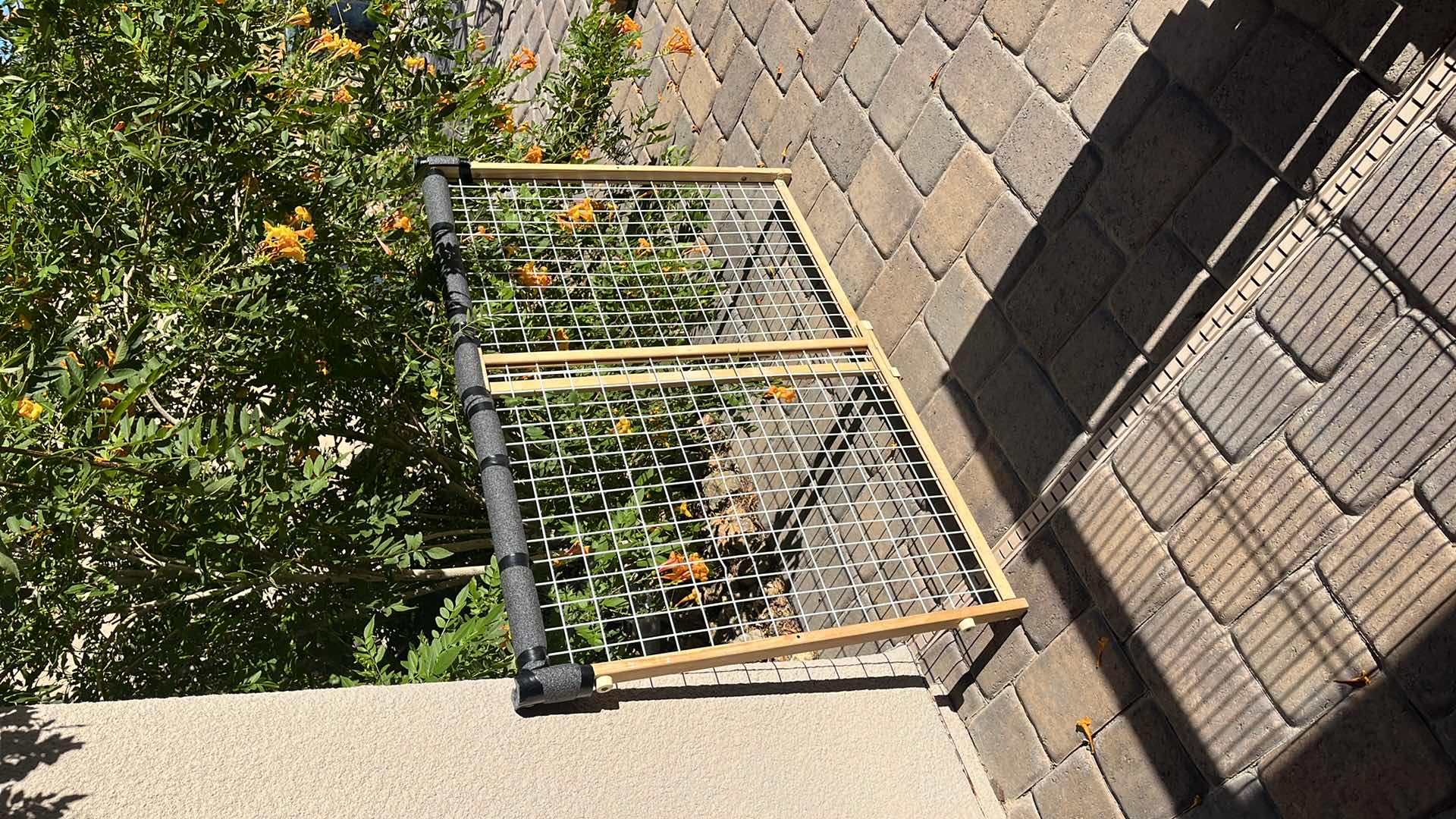 Photo 2 of HOME DECOR TWO SLIDING DOG GATE 
BROWN AND BLACK GATE 32” X 1” X H 20.25”
TAN AND WHITE GATE 47.5” X 2” X H 32”