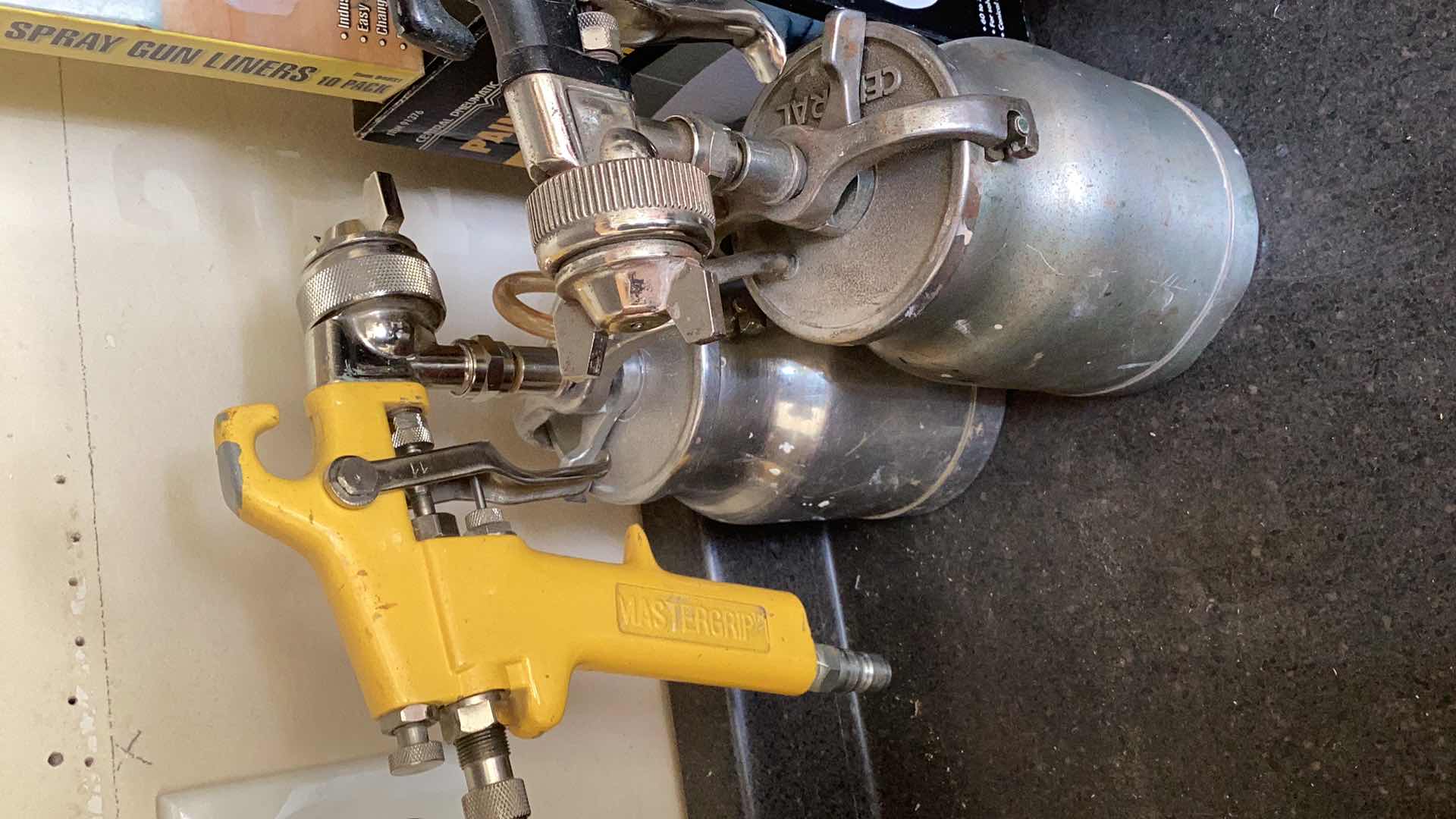 Photo 1 of 2 PAINT SPRAYERS WITH STRAINERS, HOLDER  AND LINERS