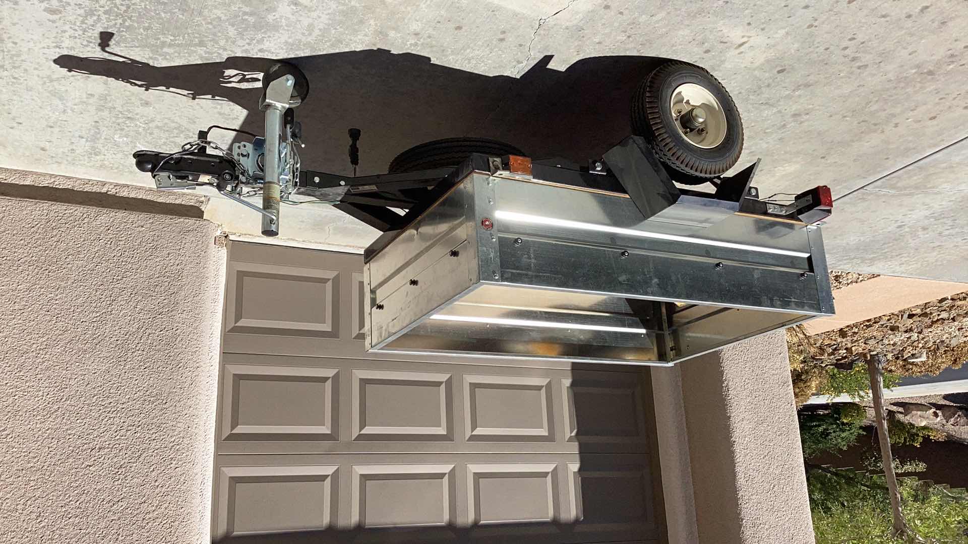 Photo 9 of HAUL-MASTER CARGO BOX TRAILER 55” X 35” HOLD UP TO 1000 POUNDS. INCLUDES, SAFTEY CHAIR, TAIL LIGHT WITH WIRING HARNESS, AND TWO WHEELS . D.O.T. CERTIFIED. TITLE IN HAND