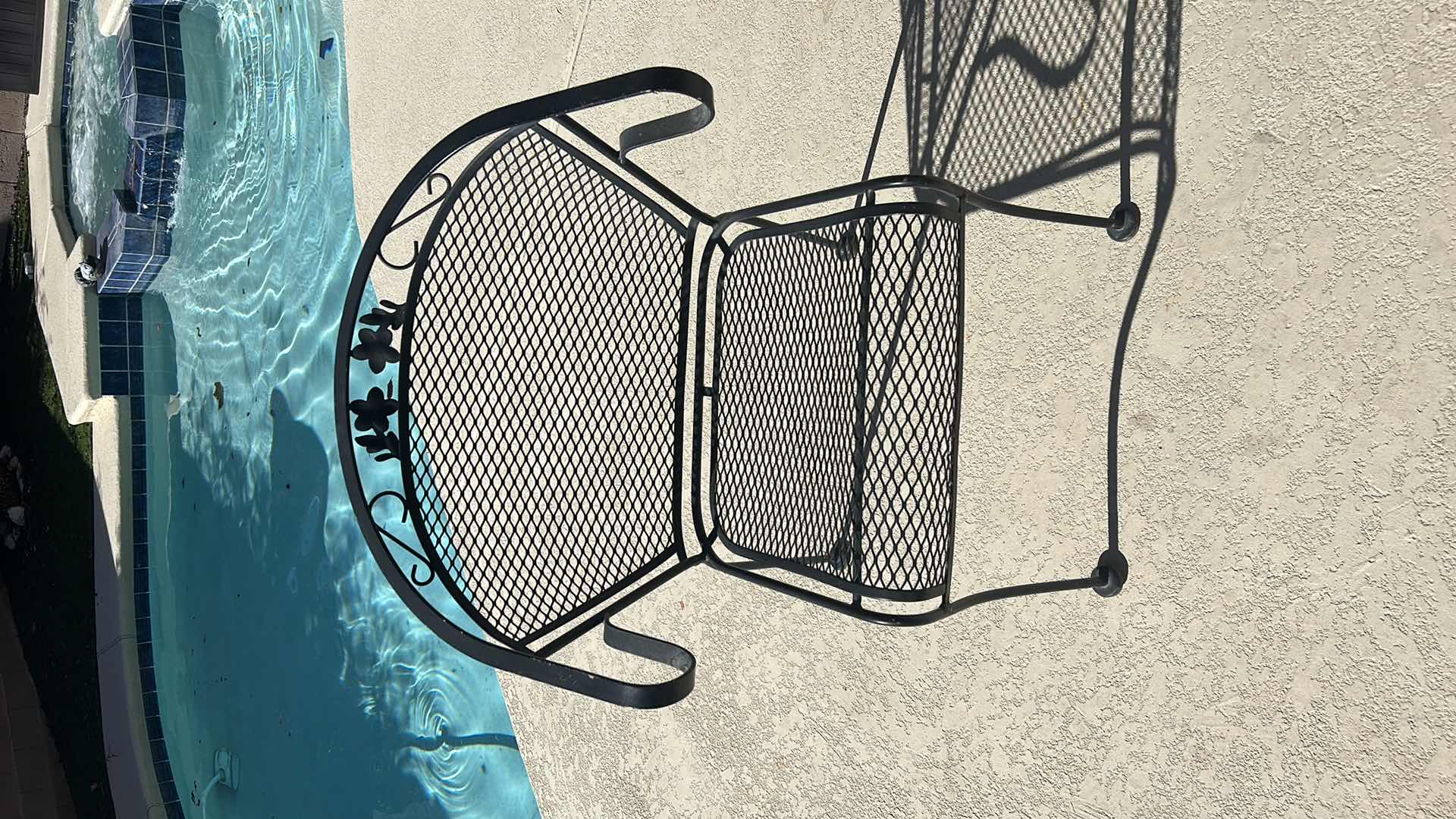 Photo 2 of 42” BLACK WROUGHT IRON TABLE AND 4 CHAIRS