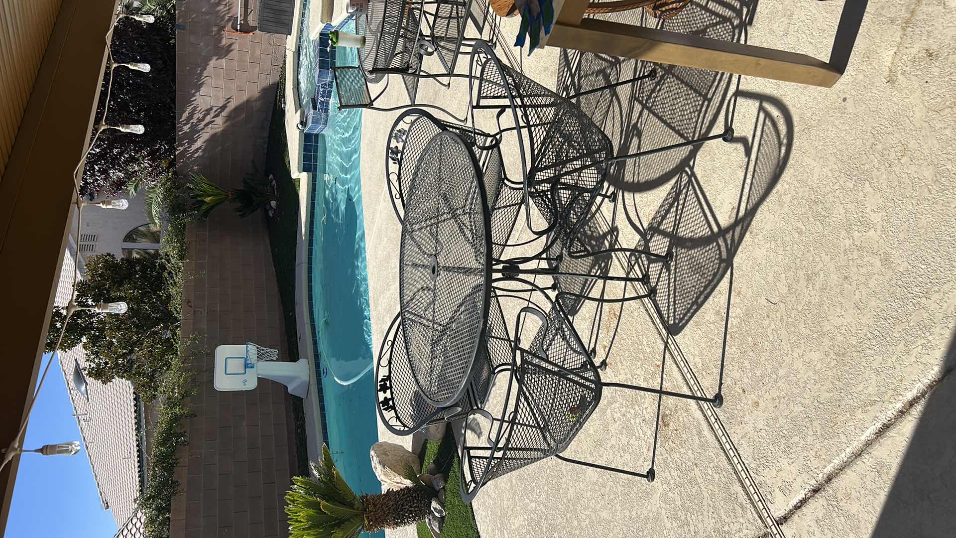 Photo 4 of 42” BLACK WROUGHT IRON TABLE AND 4 CHAIRS