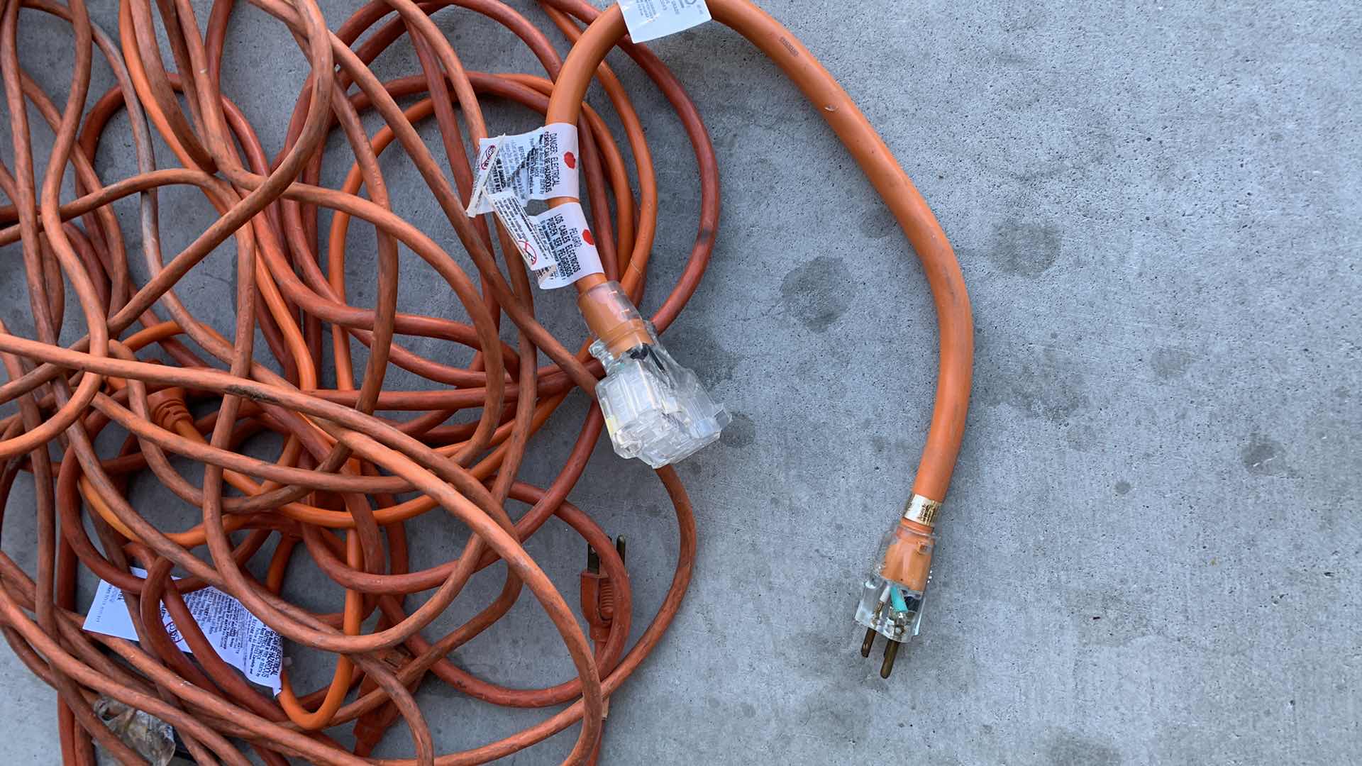 Photo 1 of 2 EXTENSION CORDS AND 3 WAY PLUG