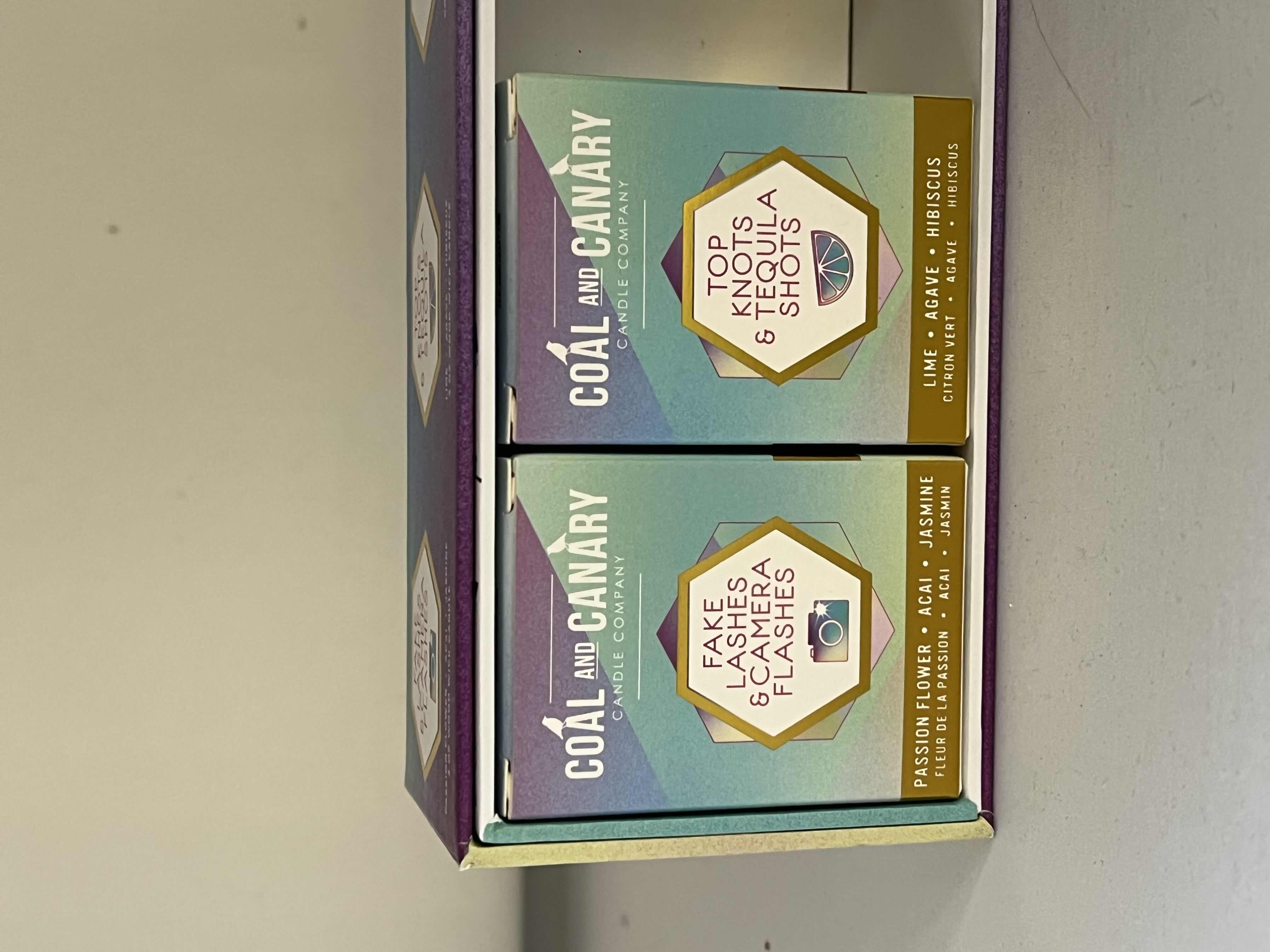 Photo 1 of 4-NEW IN BOX COAL AND CANARY 3OZ HAND POURED WOOD WICK CANDLES. “GIRLS NIGHT OUT” COLLECTION. (1 CANDLE MISSING FROM SET OF 5)