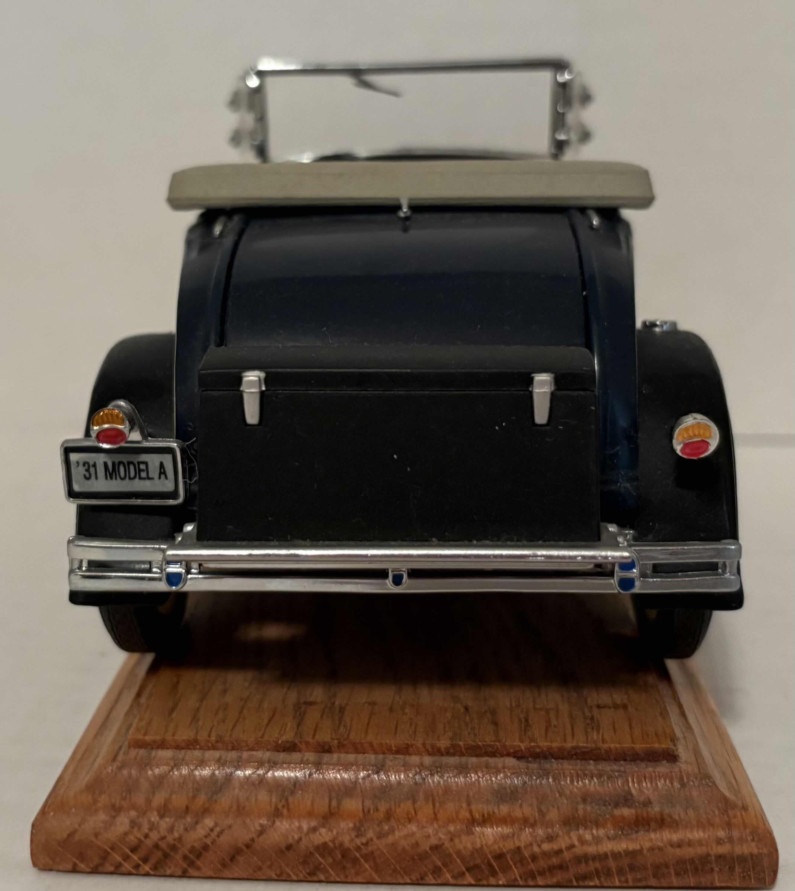 Photo 1 of 1999 MOTORCITY CLASSICS 1/18 SCALE ‘31 MODEL A CAR WITH MOVING PARTS AND WOODEN STAND