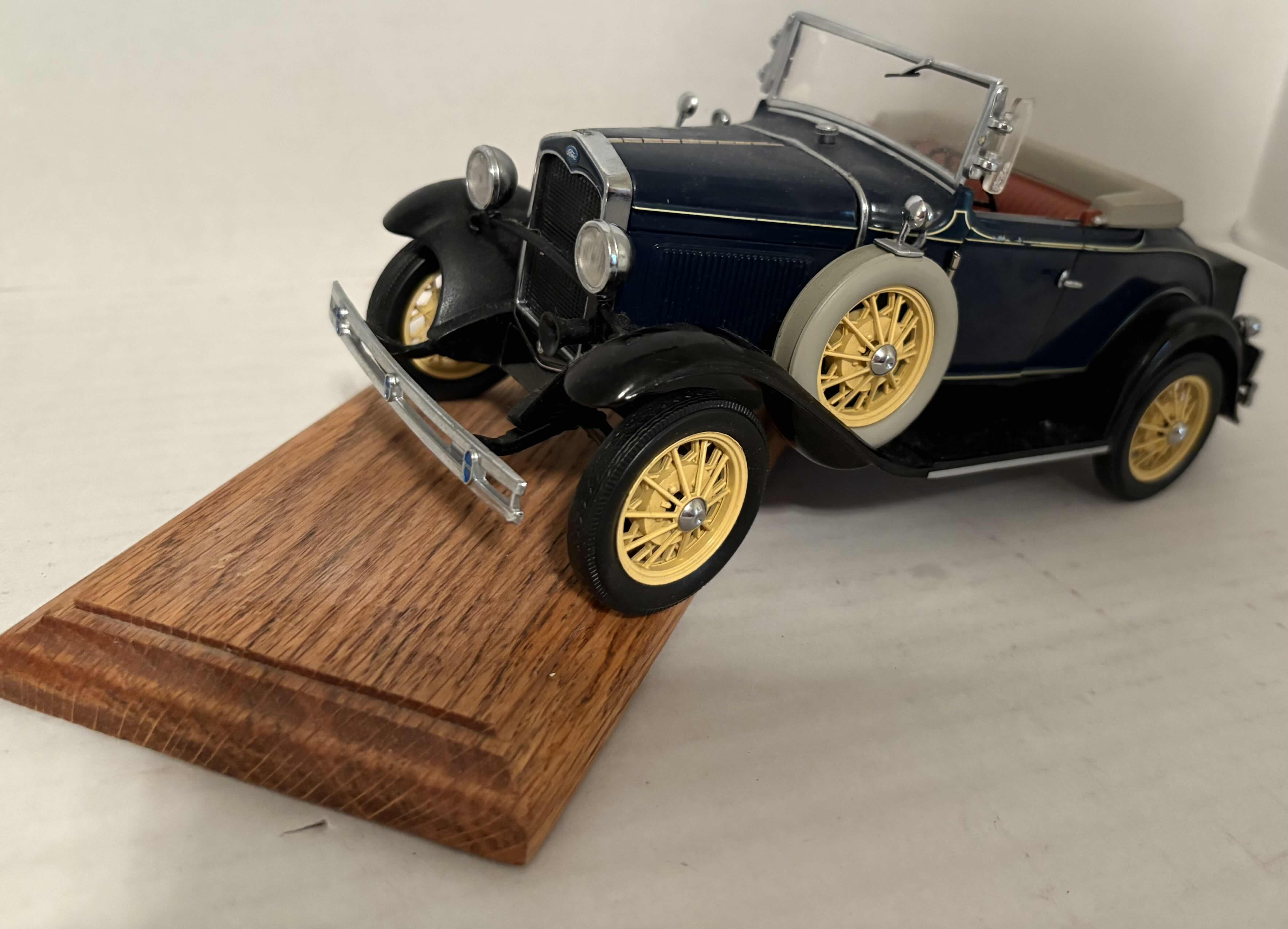 Photo 1 of 1999 MOTORCITY CLASSICS 1/18 SCALE ‘31 MODEL A CAR WITH MOVING PARTS AND WOODEN STAND