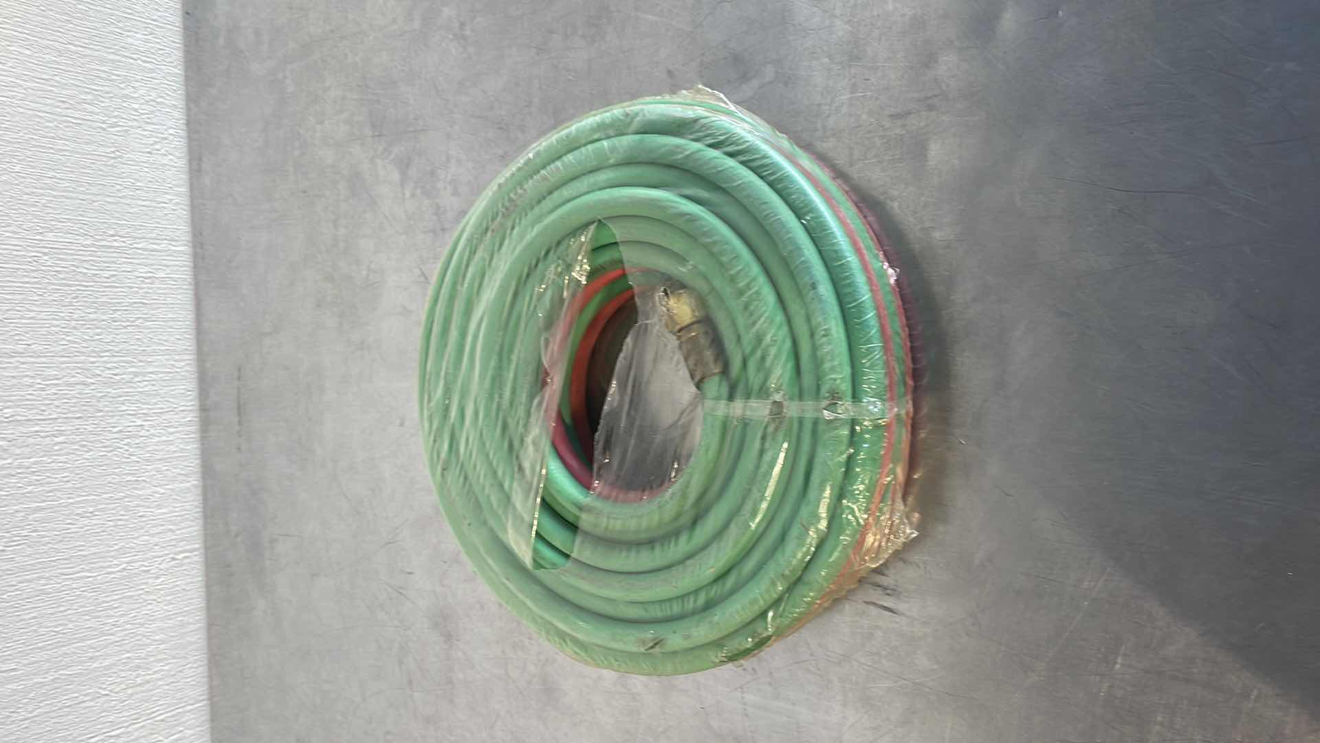 Photo 1 of LINCOLN ELECTRIC OXY-ACETYLENE HOSE — 1/4IN. DIA. X 25FT.L, 100 PSI, MODEL# KH578