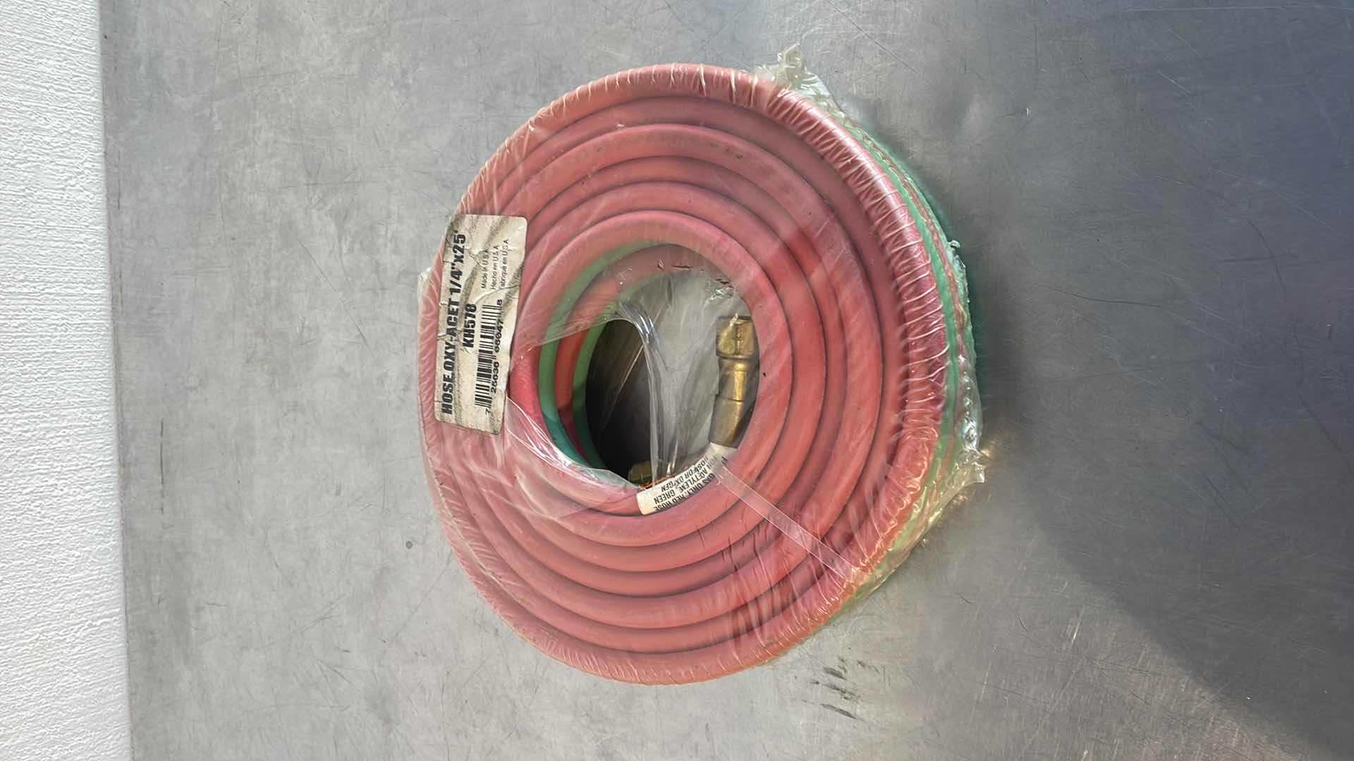 Photo 1 of LINCOLN ELECTRIC OXY-ACETYLENE HOSE — 1/4IN. DIA. X 25FT.L, 100 PSI, MODEL# KH578