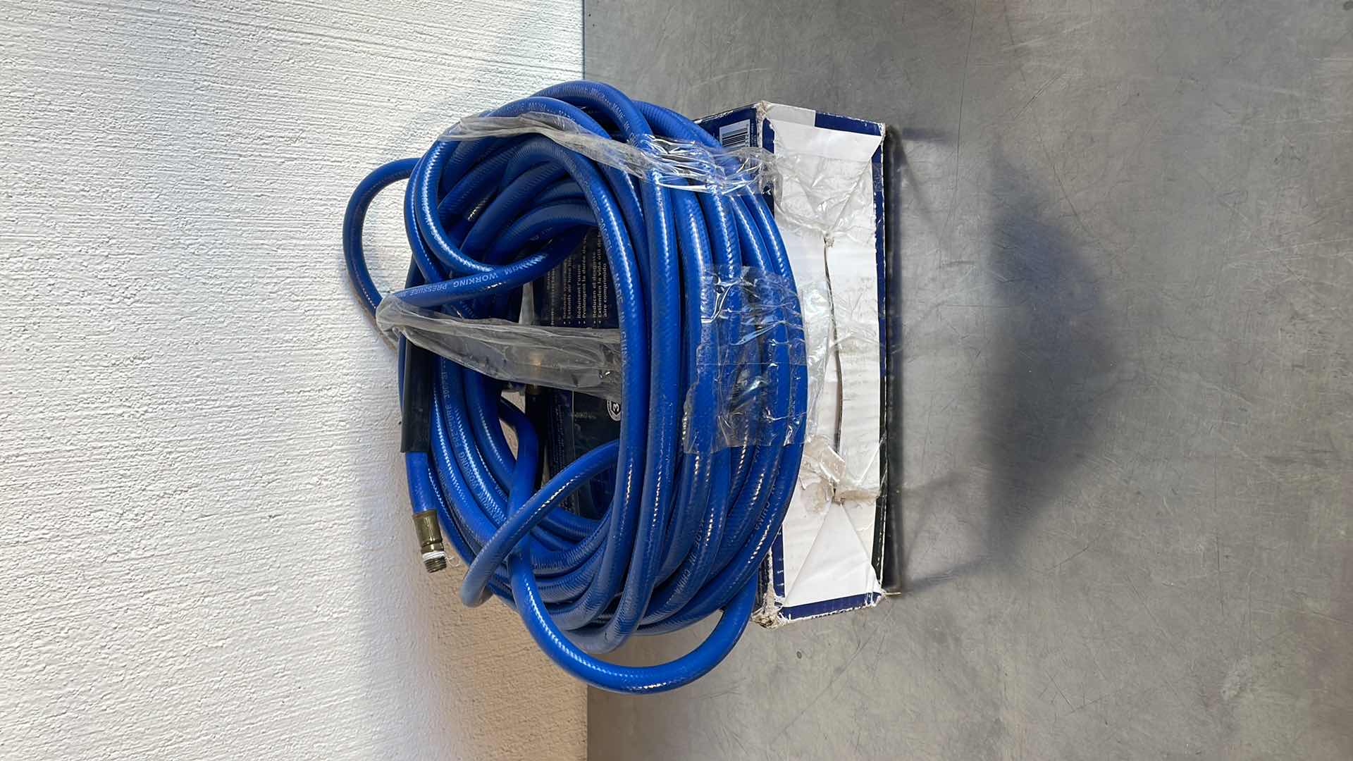 Photo 1 of KOBALT PVC AIR HOSE 3/8” X 50’ IN BOX AND USED ONE ON TOP (100’ TOTAL)