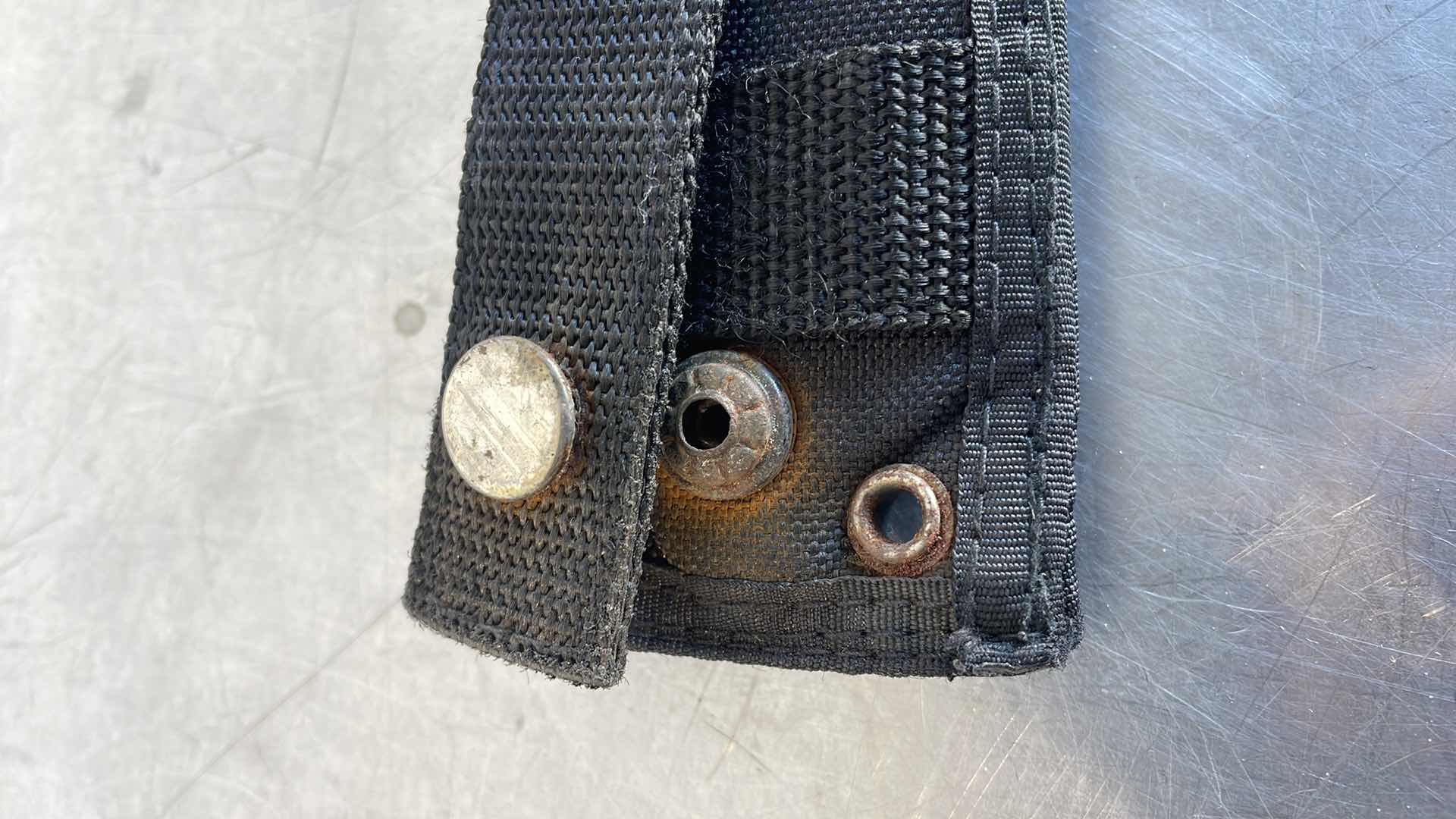 Photo 1 of SOG KNIFE NEEDS TLC AND SNAP BROKE ON HOLDER. STILL SHARP