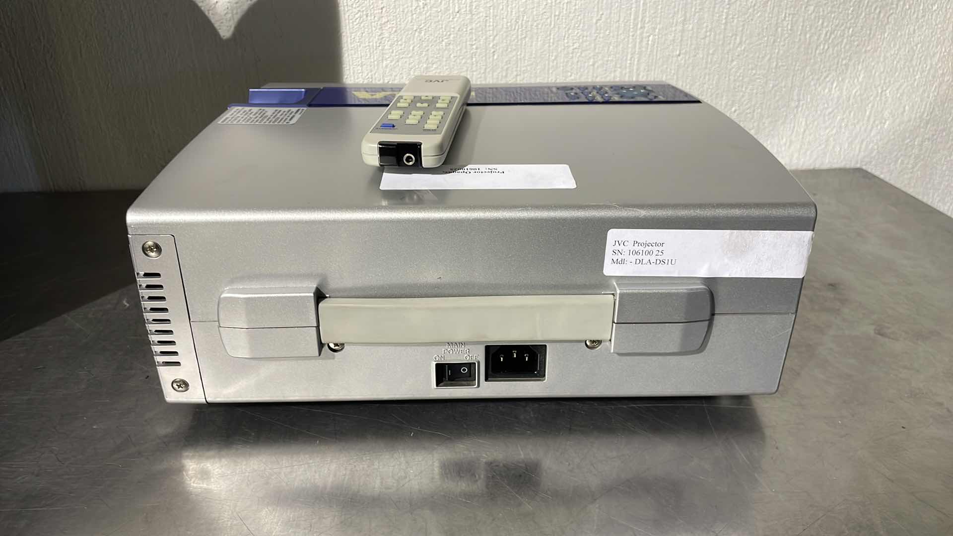 Photo 1 of JVC DLA-DS1U PROJECTOR WITH ROLLING CASE UNKNOWN COMBINATION TO ROLLER CASE