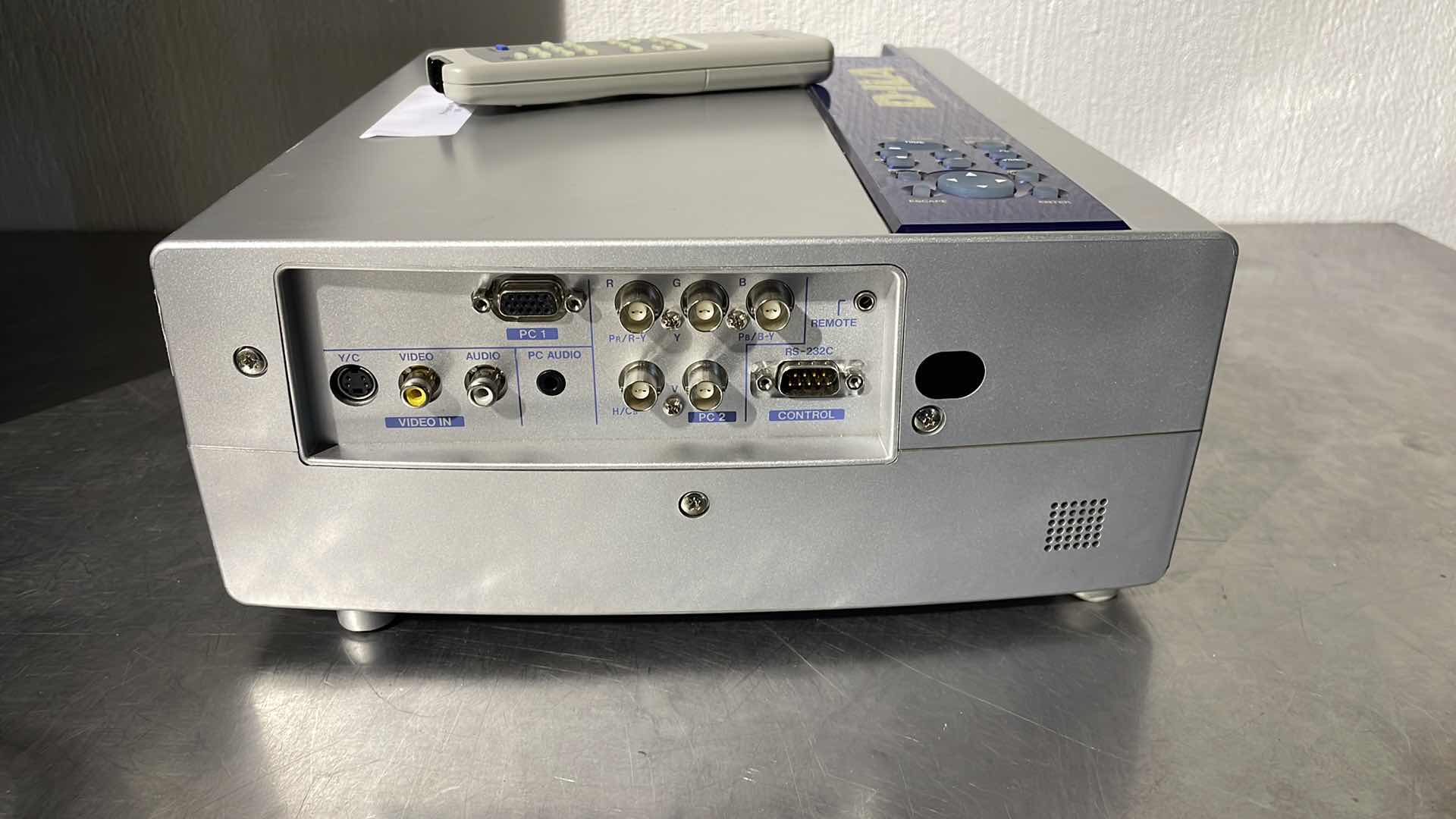 Photo 1 of JVC DLA-DS1U PROJECTOR WITH ROLLING CASE UNKNOWN COMBINATION TO ROLLER CASE