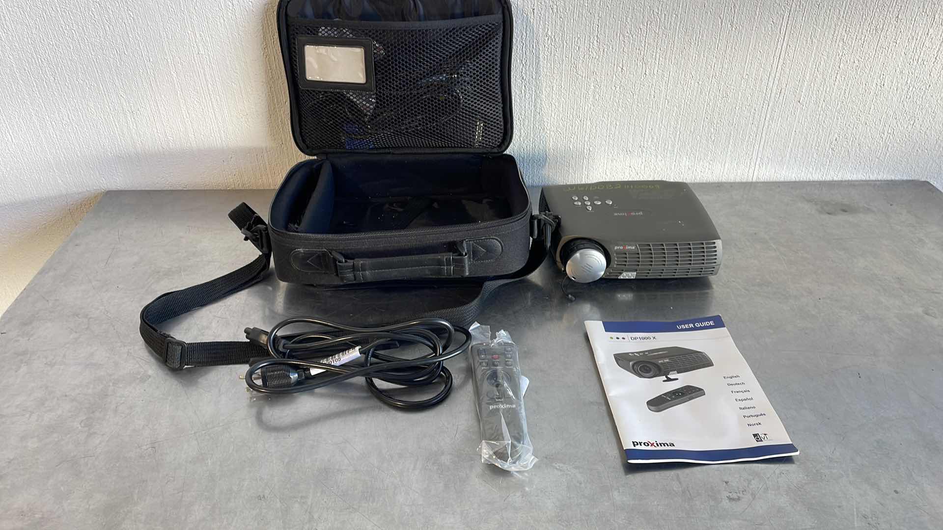 Photo 1 of PROXIMA DP1000 X PROJECTOR REMOTE BROKEN