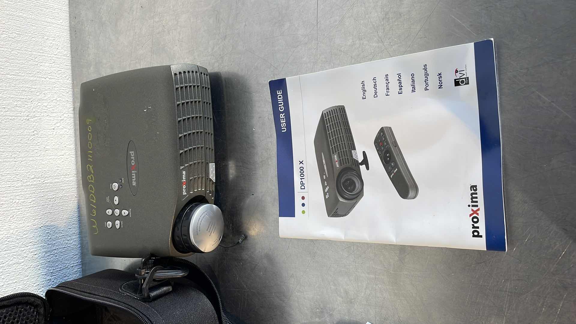 Photo 2 of PROXIMA DP1000 X PROJECTOR REMOTE BROKEN