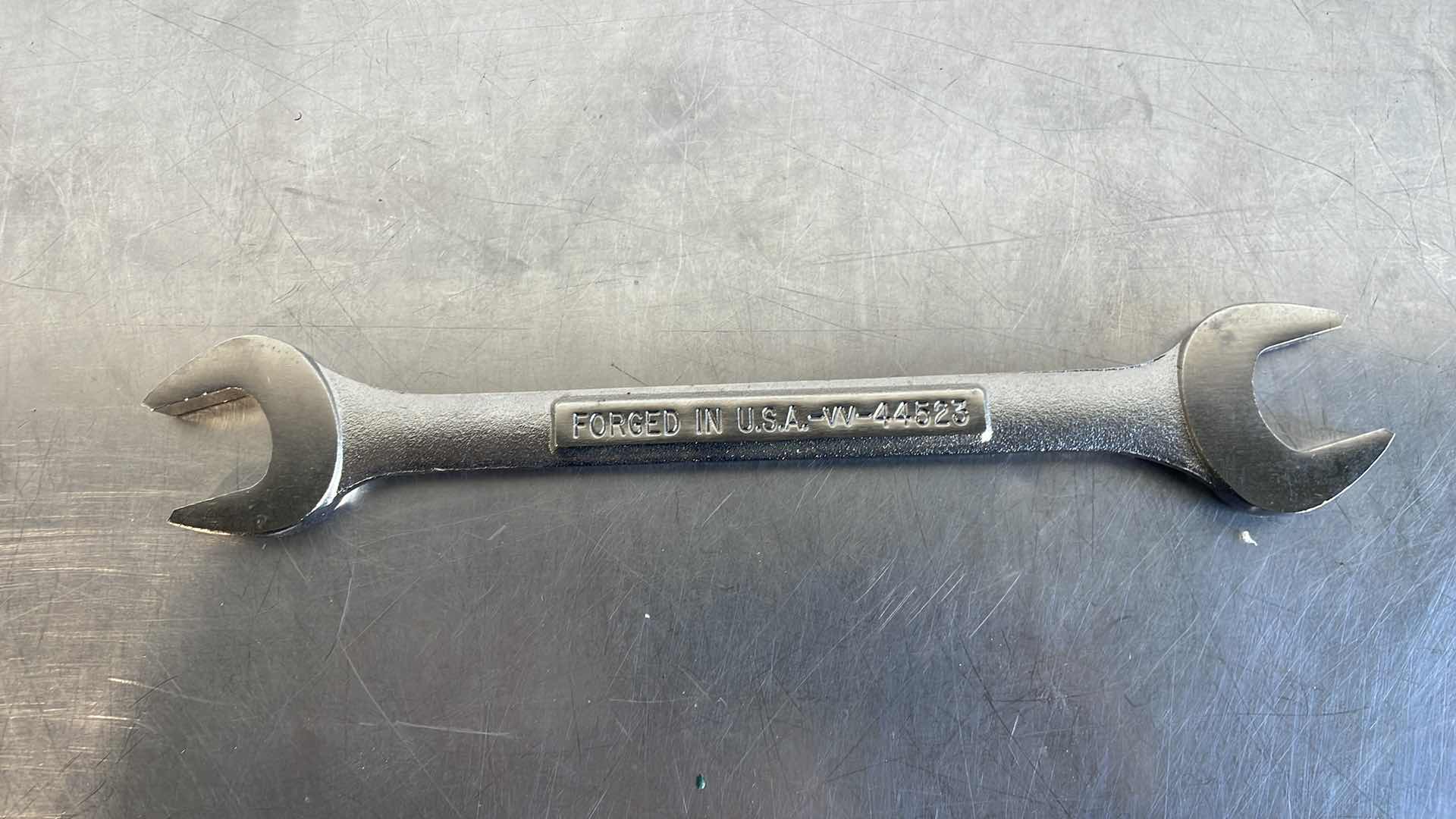 Photo 1 of CRAFTSMAN OPEN END WRENCH 21MM AND 23MM USA