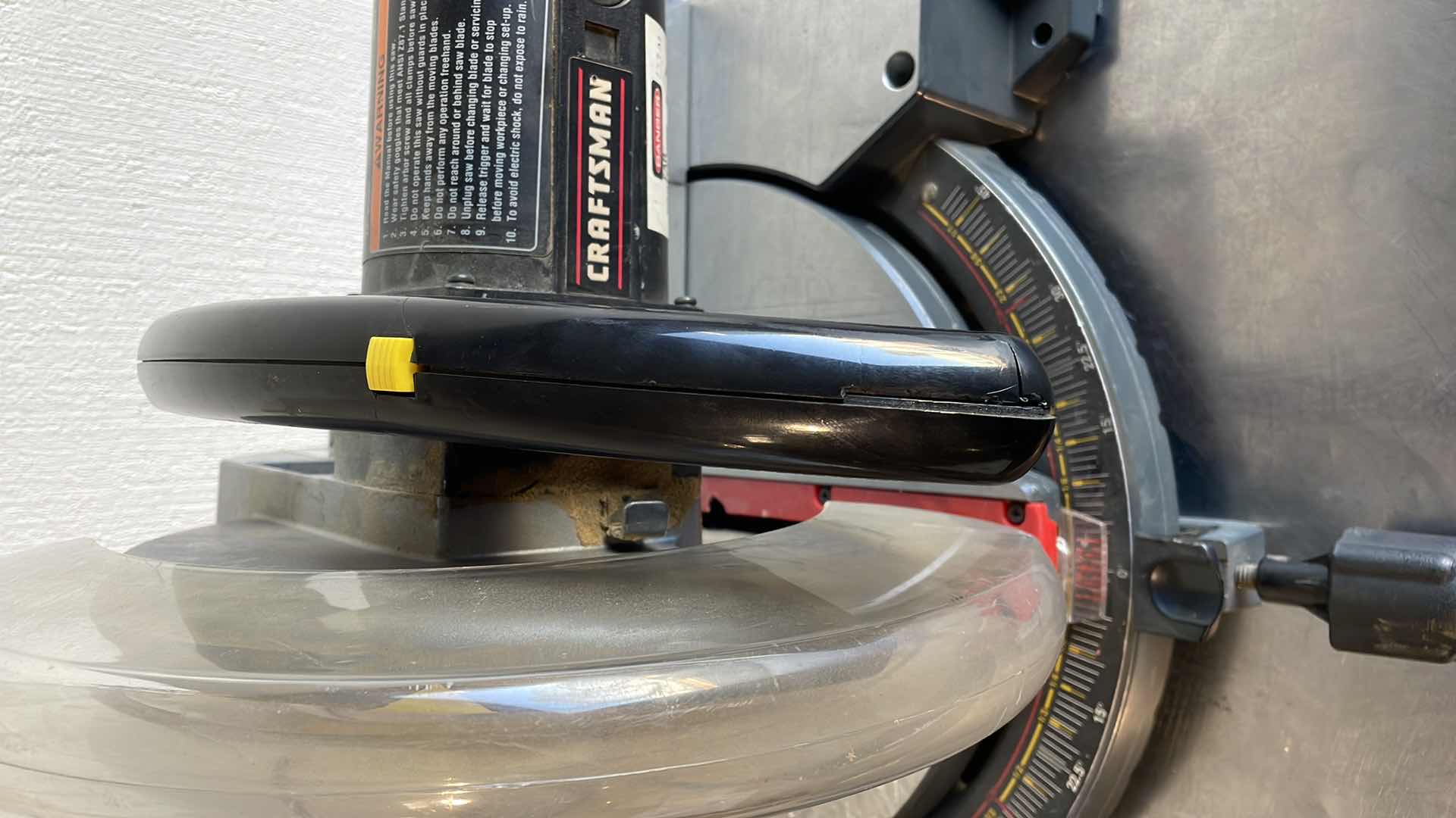 Photo 1 of CRAFTSMAN 12” COMPOUND MITER SAW HANDLE CRACKED STILL WORKS  SOLD AS IS