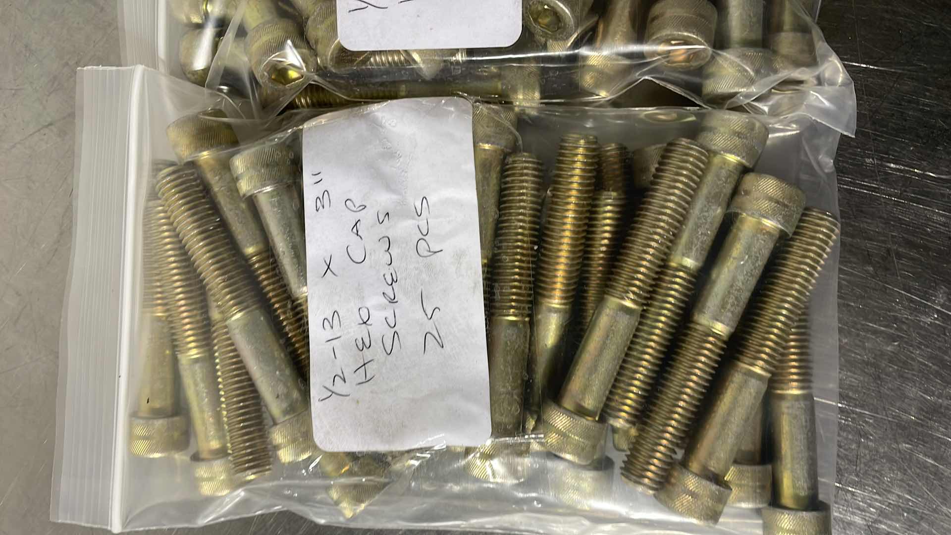Photo 1 of 1/“2-13 x 3" HEX CAP SCREWS 2-25 pcs