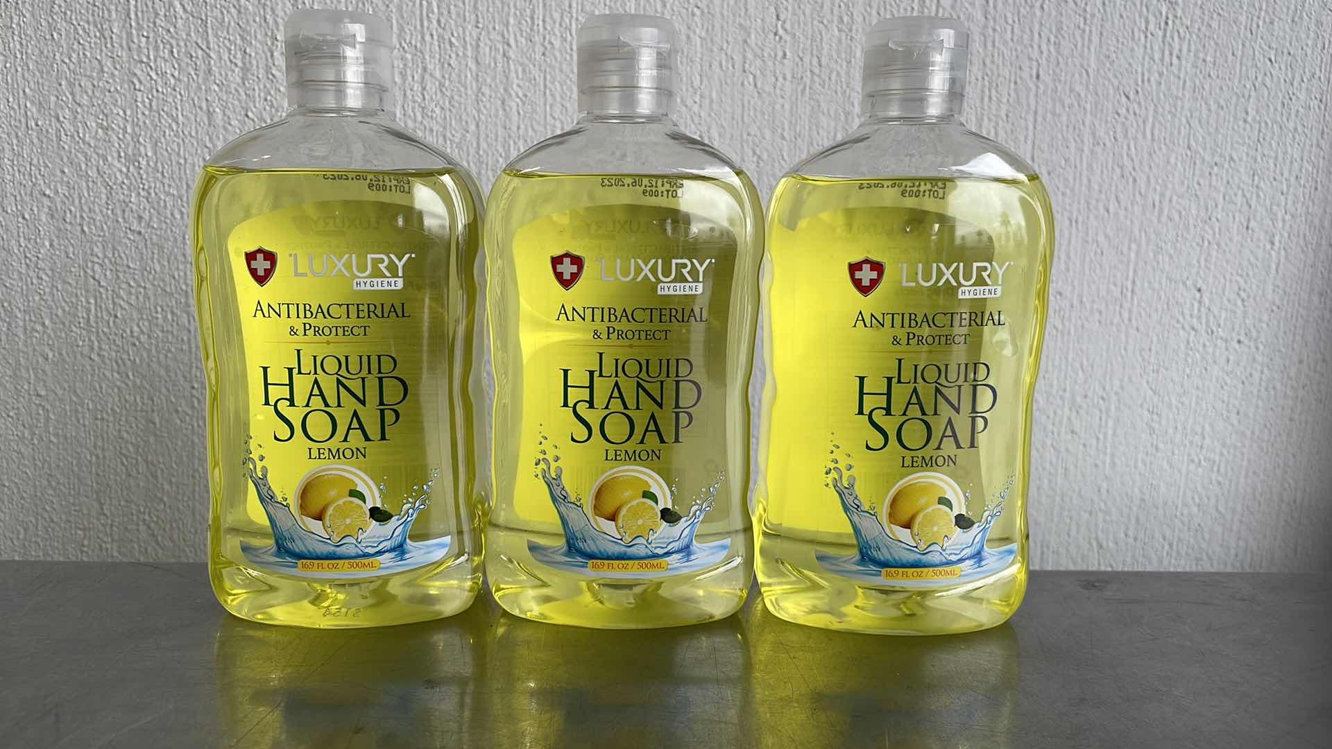 Photo 1 of LUXURY HYGIENE LEMON LIQUID HAND SOAP 3-16.9oz BOTTLES