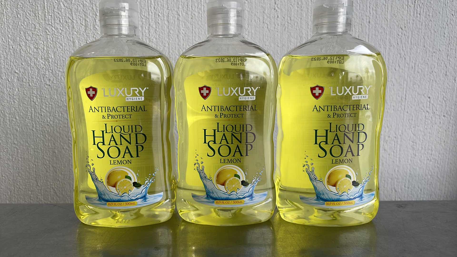 Photo 1 of LUXURY HYGIENE LEMON LIQUID HAND SOAP 3-16.9oz BOTTLES