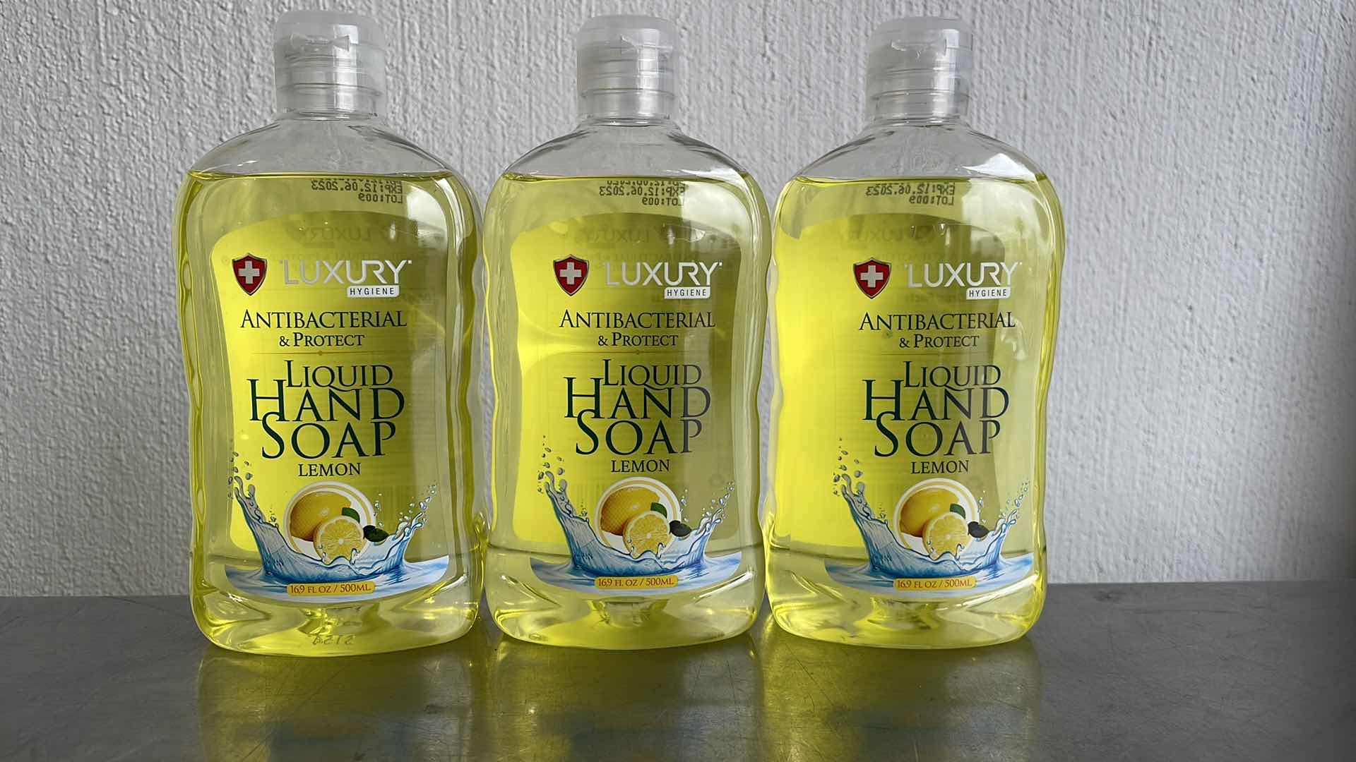 Photo 1 of LUXURY HYGIENE LEMON LIQUID HAND SOAP 3-16.9oz BOTTLES