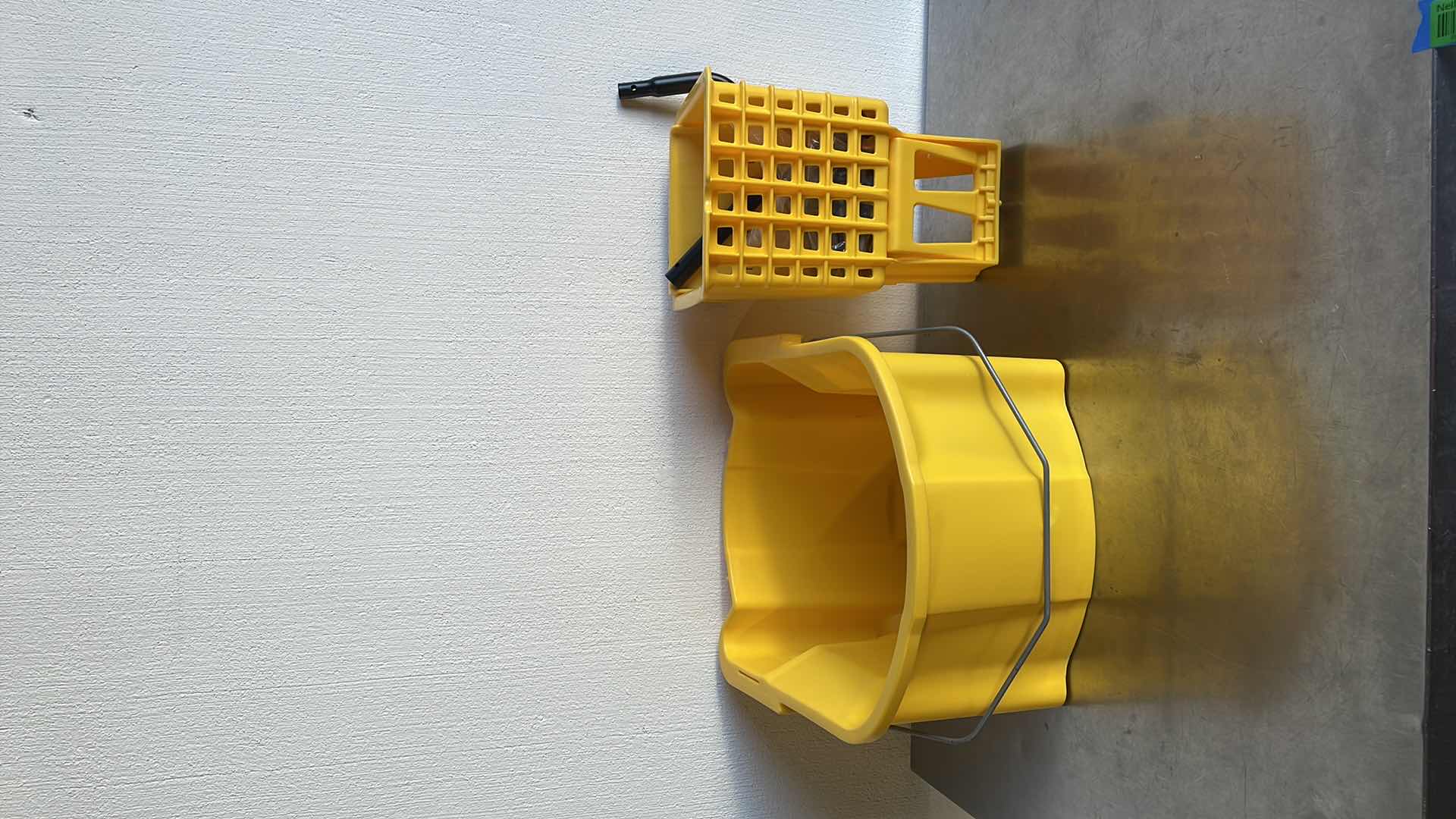 Photo 1 of GENUINE JOE MOP BUCKET WRINGER COMBO - 3'' CASTERS - 26 QT. - YELLOW