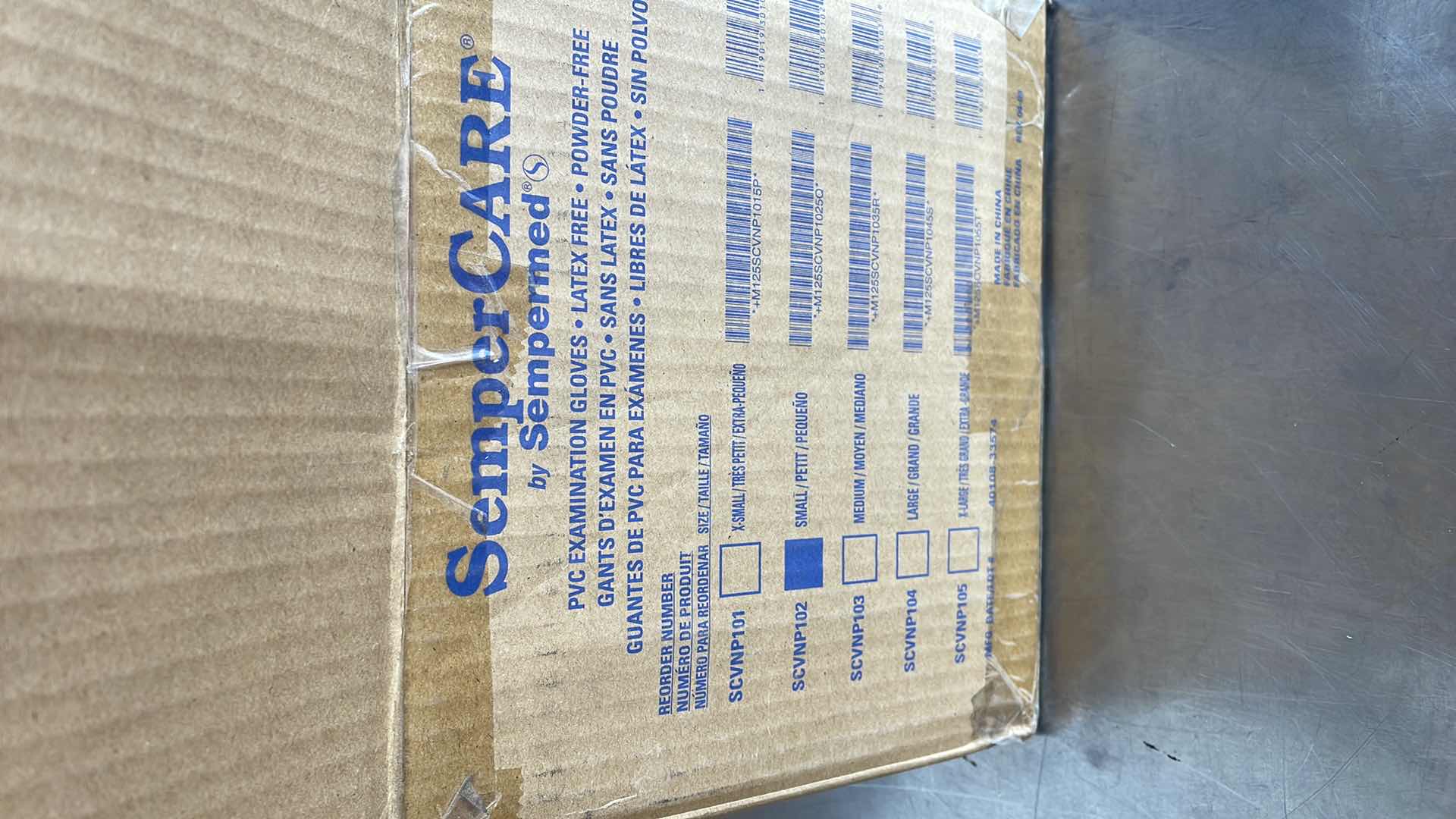 Photo 1 of SEMPERCARE PVC EXAMINATION GLOVES SMALL