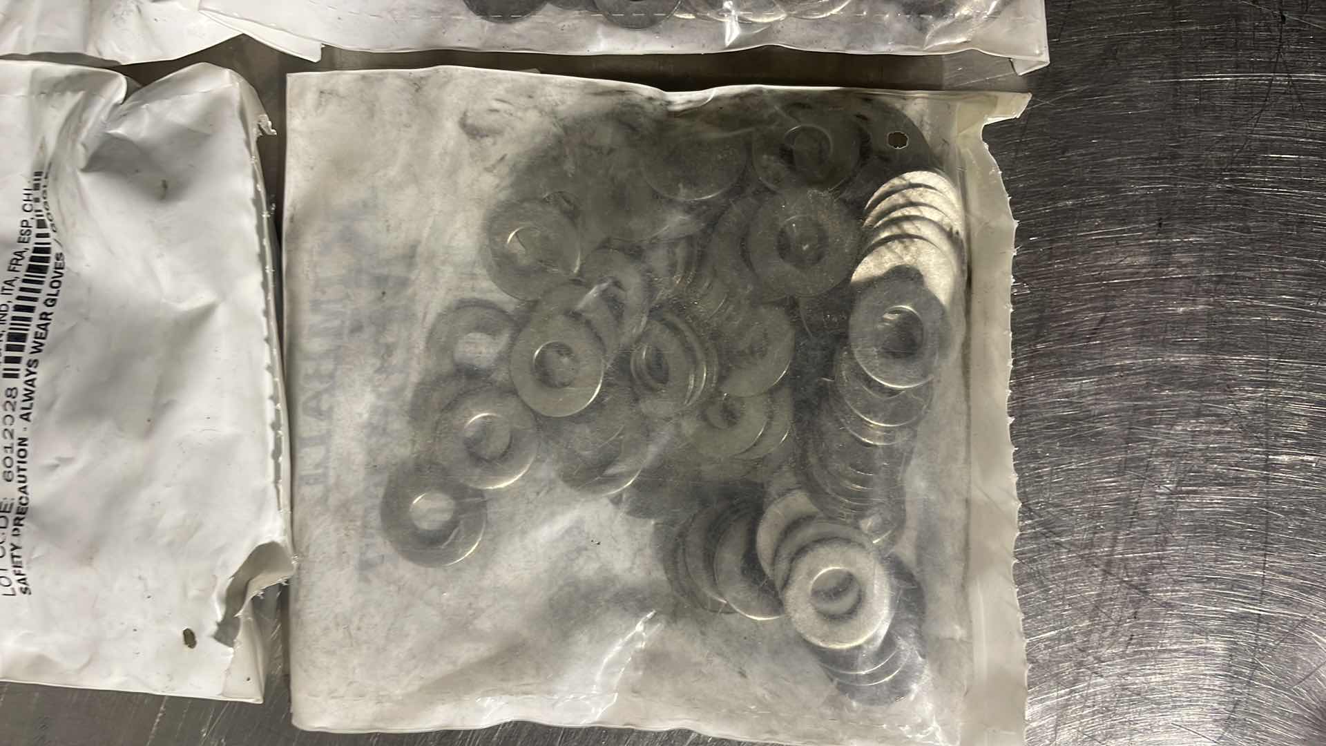 Photo 1 of 1/4" STAINLESS FLAT WASHER,5/8" OUTSIDE DIAMETER,18-8 (304) STAINLESS STEEL 4-100CT